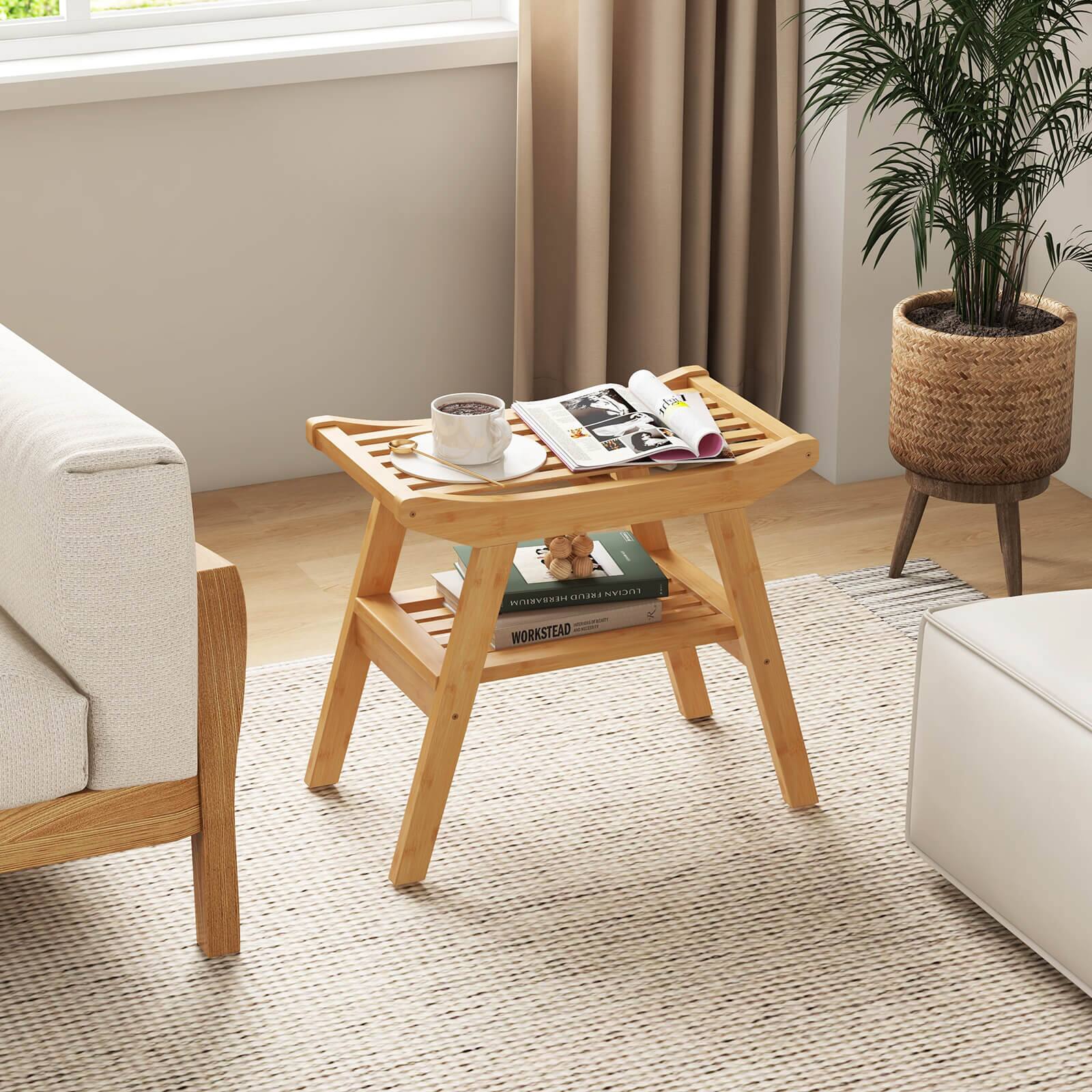 The image shows a living room with a wooden coffee table, a couch, and a chair. The coffee table has a cup of coffee and a magazine on it. There is also a potted plant in the room, adding a touch of greenery to the space. The arrangement of the furniture and the presence of the coffee table suggest a comfortable and inviting atmosphere for relaxation and leisure.