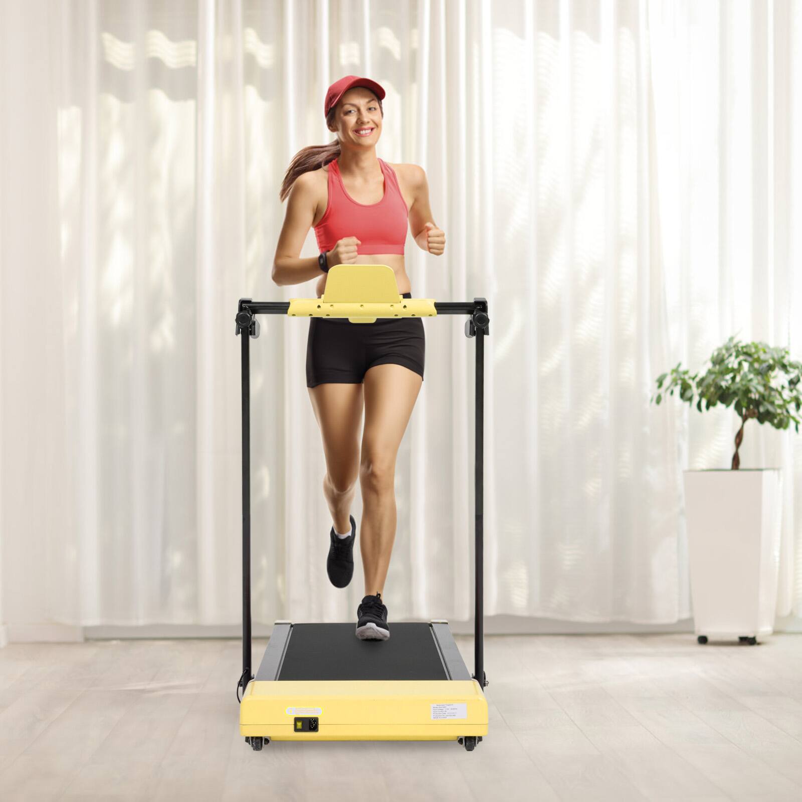 Left. Akoasm - Walking Pad Folding Treadmills for Home with LED Displays and Built-in Wheels for Walking & Running - Yellow.