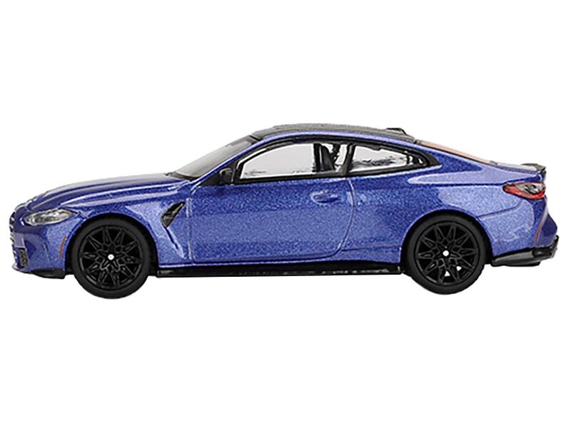 Angle. Mini GT - BMW M4 Competition Portimao Blue Metallic with Carbon Top Limited Edition 1/64 Diecast Model Car by Mini GT - Blue Metallic with Carbon.