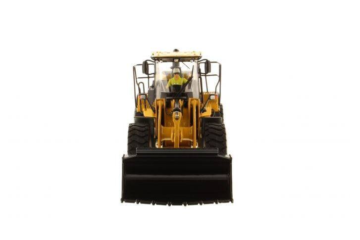 Angle. Diecast Masters - CAT Caterpillar 966M Wheel Loader with Operator "Core Classics Series" 1/50 Diecast Model  by Diecast Masters - Yellow and Black.
