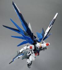 Left. Bandai - Bandai Model Kit: MG 1/100 Freedom Gundam (Ver 2.0).
