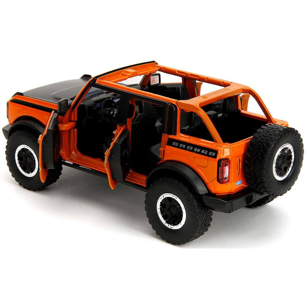 Back. Jada - 2021 Ford Bronco Open-Top Orange with Black Stripes and Hood with Extra Wheels "Just Trucks" Series 1/24 - Orange with Black Stripes.