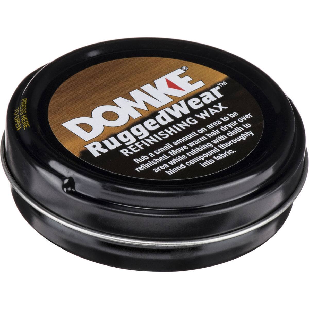 DOMKE  
RuggedWear™  
REFINISHING WAX  

Press here to open  

Rub a small amount on area to be refinished while compound is warm with hair dryer over area. Move rubbing cloth to blend into fabric.