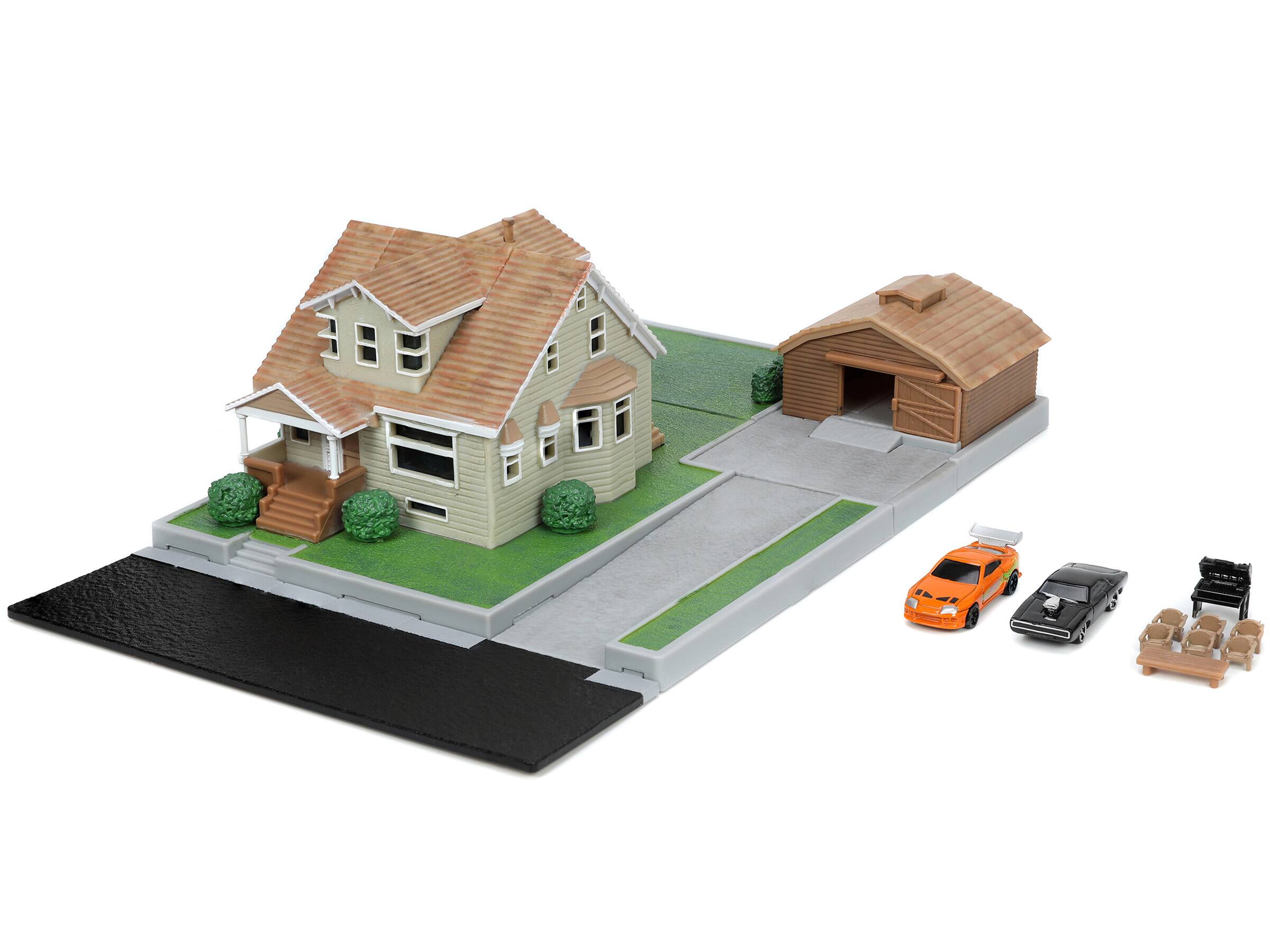 Angle. Jada - Toretto House Diorama with Dodge Charger Black & Toyota Supra Orange "Fast & Furious" Nano Scene Series by Jada - Multicolor.