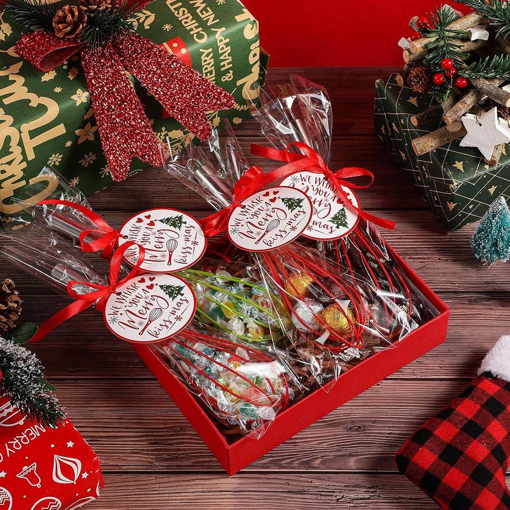 Sure, here is the corrected and grouped text from the image:

---

**CHRISTMAS & HAPPY NEW YEAR**

**WE WISH YOU A MERRY CHRISTMAS**

**WE WISH YOU A MERRY CHRISTMAS**

**WE WISH YOU A MERRY CHRISTMAS**

**WE WISH YOU A MERRY CHRISTMAS**

---

This text is found on the gift tags and the wrapping paper in the image.