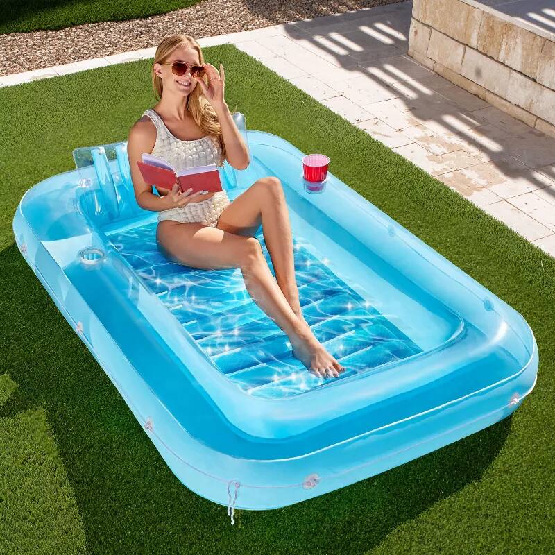 Angle. Joyfy - Inflatable Tanning Pool with Pillow, Suntan Tub Floatie Raft Suntanning Float Bed for Adult 70" - Blue.