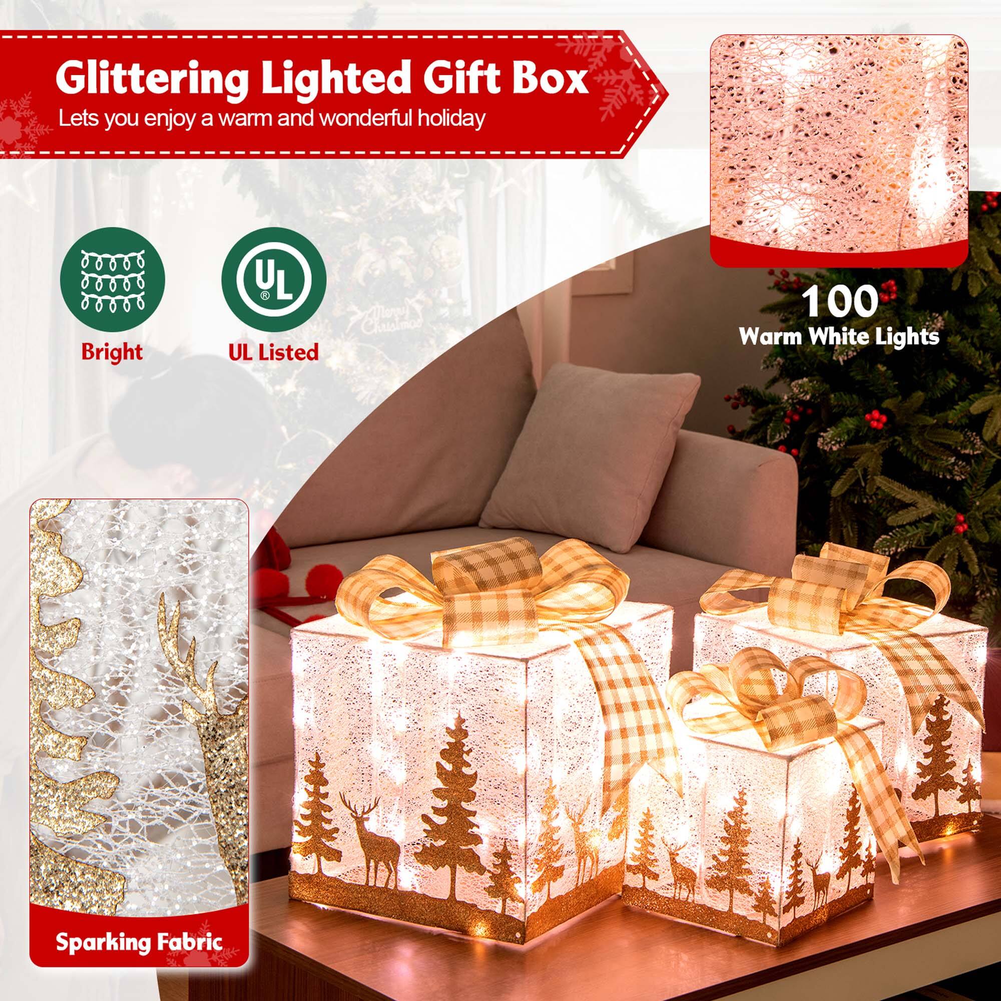 Glittering Lighted Gift Box Lets you enjoy a warm and wonderful holiday Bright L Eared UL Listed 100 Warm White Lights Sparkling Fabric