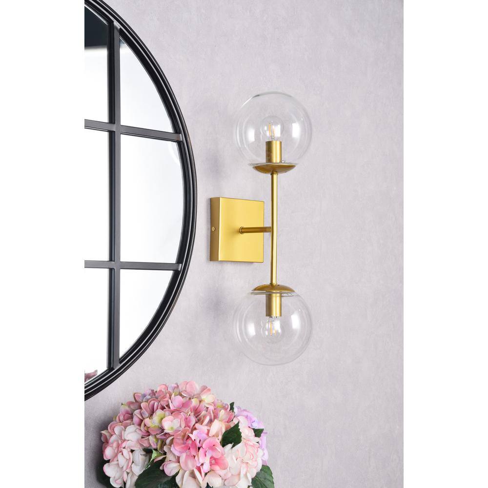 Left. Living District - Neri 2 lights brass and clear glass wall sconce - Brass And Clear.