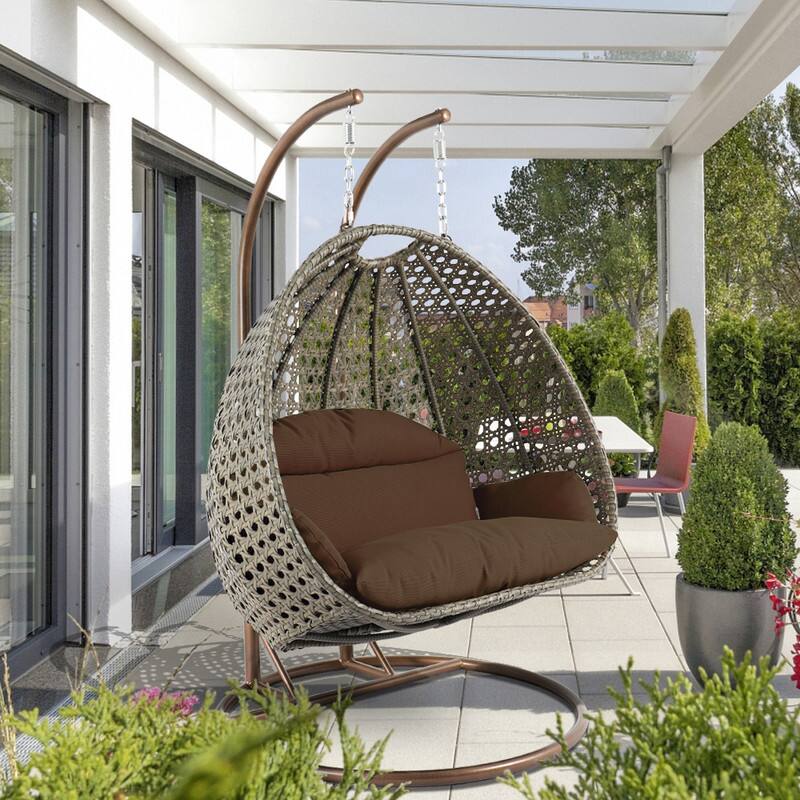 Left. LeisureMod - Leisuremod 2-Person Wicker Egg Swing Chair with Stand & Washable Cushions - Indoor/Outdoor Double Hanging Patio Chair - Brown.