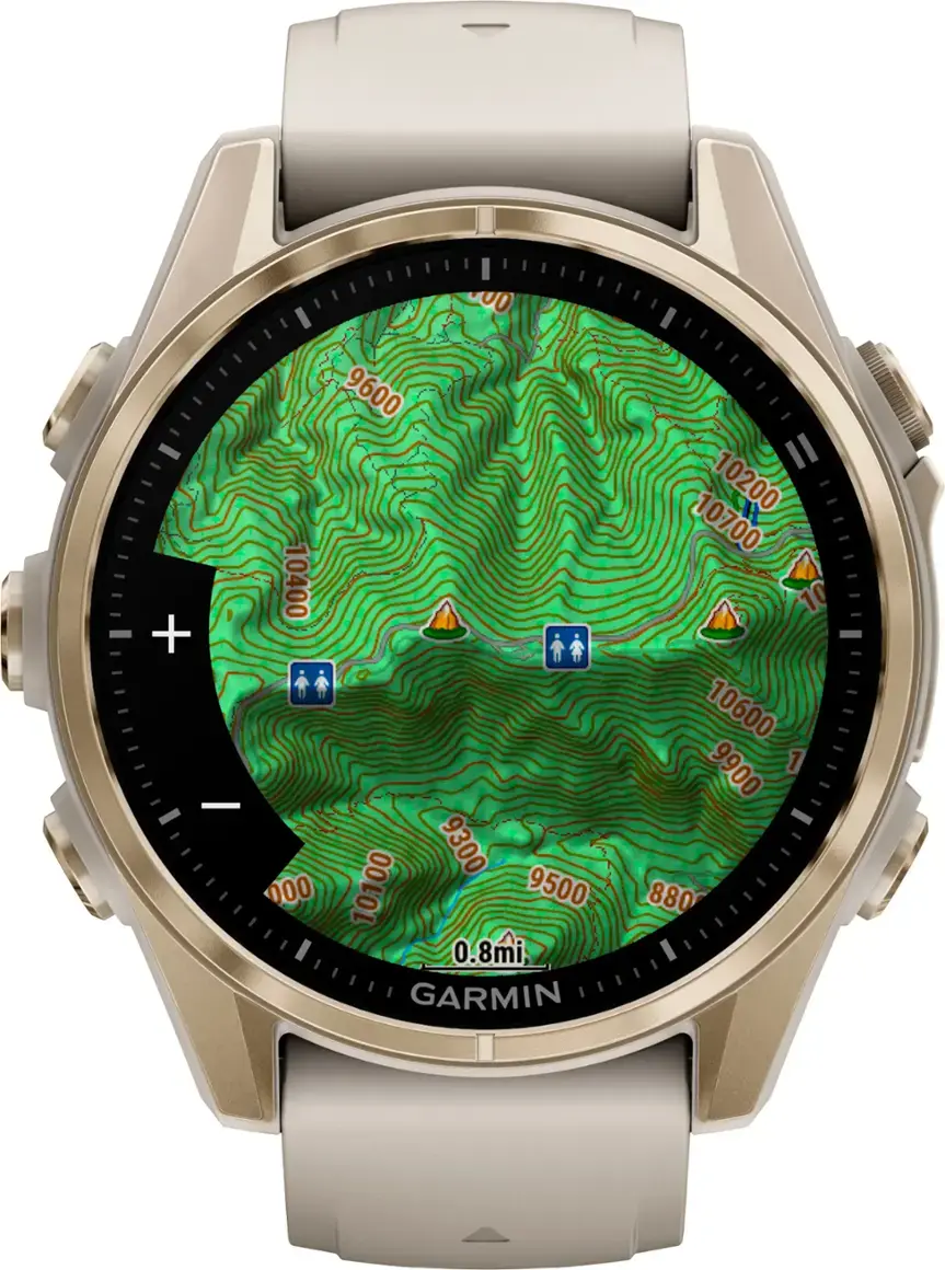 The text on the image reads: "00 + 9600 10400 9300 000 10100 9500 0.8mi GARMIN 10200 10700 10 10600 9900 880." This text is likely related to the Garmin watch, which is a brand known for its GPS-enabled devices. The numbers and symbols in the text might represent different features or settings on the watch, such as distance traveled, elevation, or other navigational information.