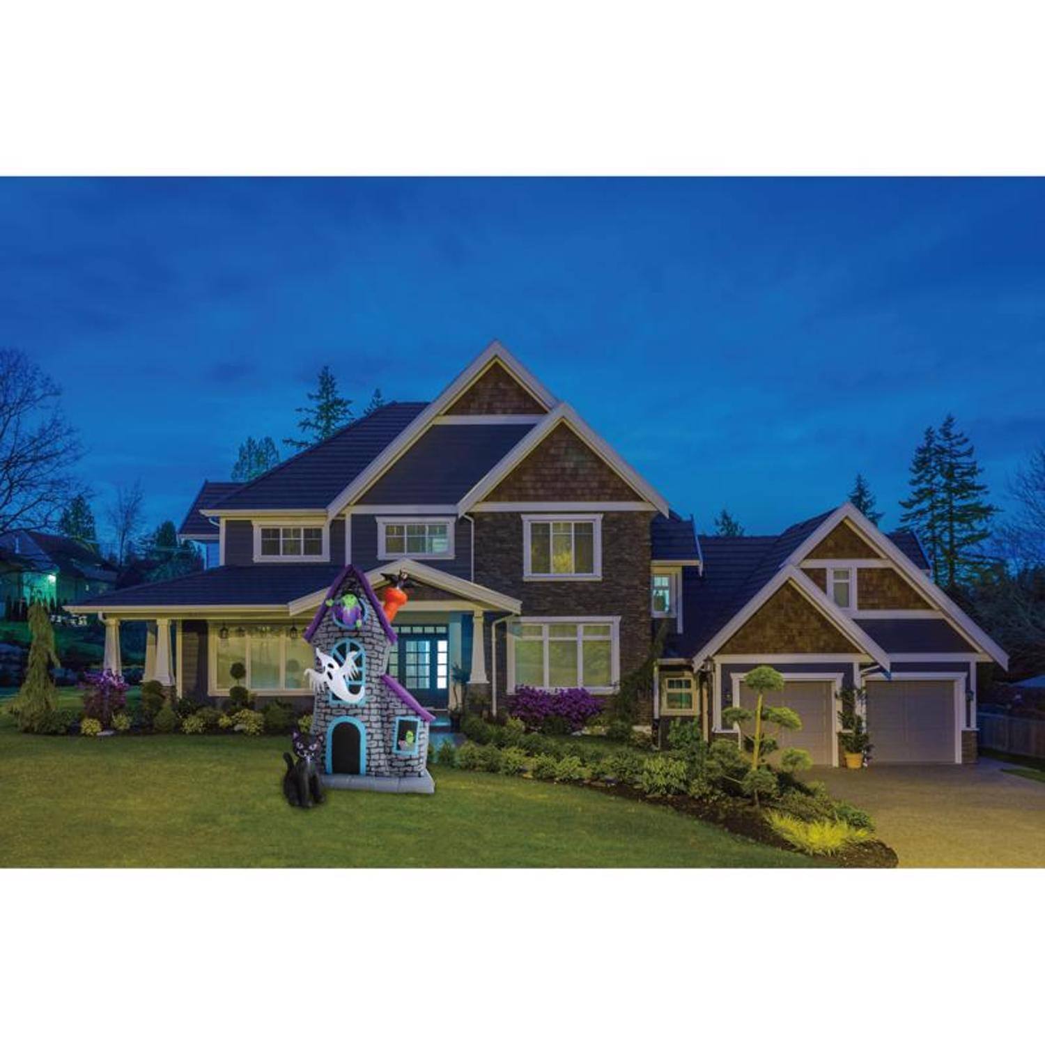 Left. A Holiday Company - A Holiday Company 12 ft. LED Prelit Haunted House Inflatable - Multicolored.