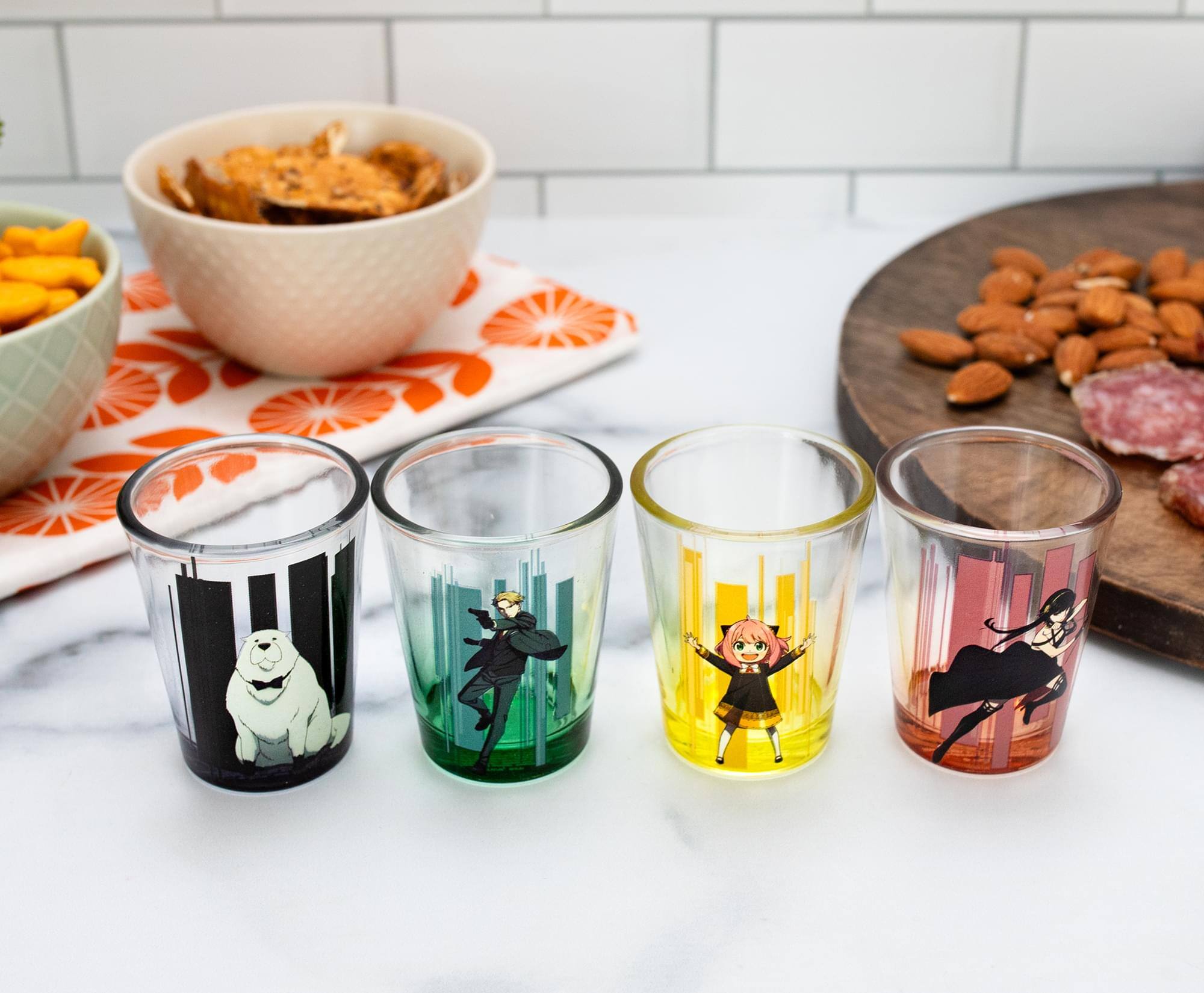 Alt View 2. Silver Buffalo - Spy x Family Trio and Logo 2-Ounce Mini Shot Glasses | Set of 4 - Pink.