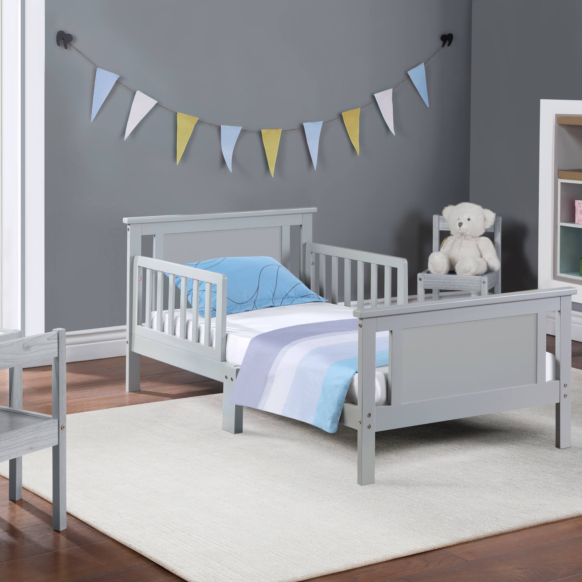 Left. GOODSILO - Reversible Panel Toddler Bed with Dual-Tone Finish for Growing Children, Solid Wood Construction - Gray.