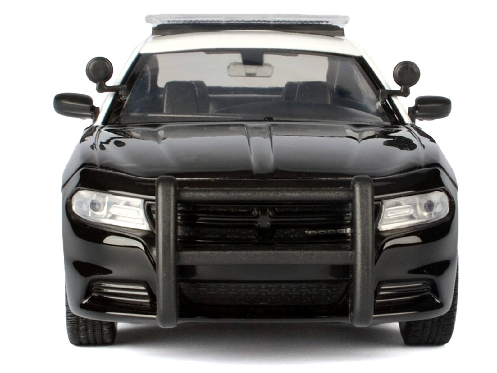 Alt View 1. Motormax - 2023 Dodge Charger Pursuit Police Car LAPD Black White Law Enforcement and Public Service Series 1/24 - Black and White.