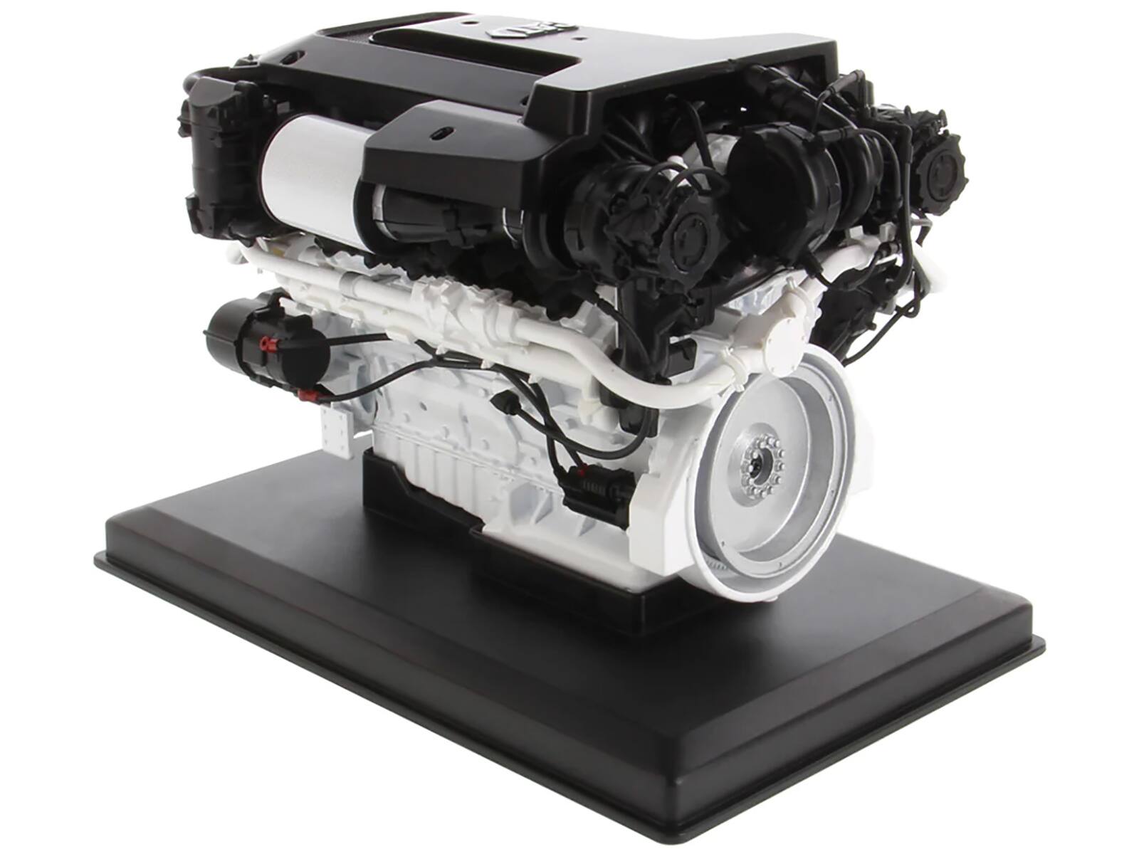 Angle. Diecast Masters - CAT Caterpillar C32B Marine Engine Replica "High Line Series" 1/12 Diecast Model by Diecast Masters - Black And White.