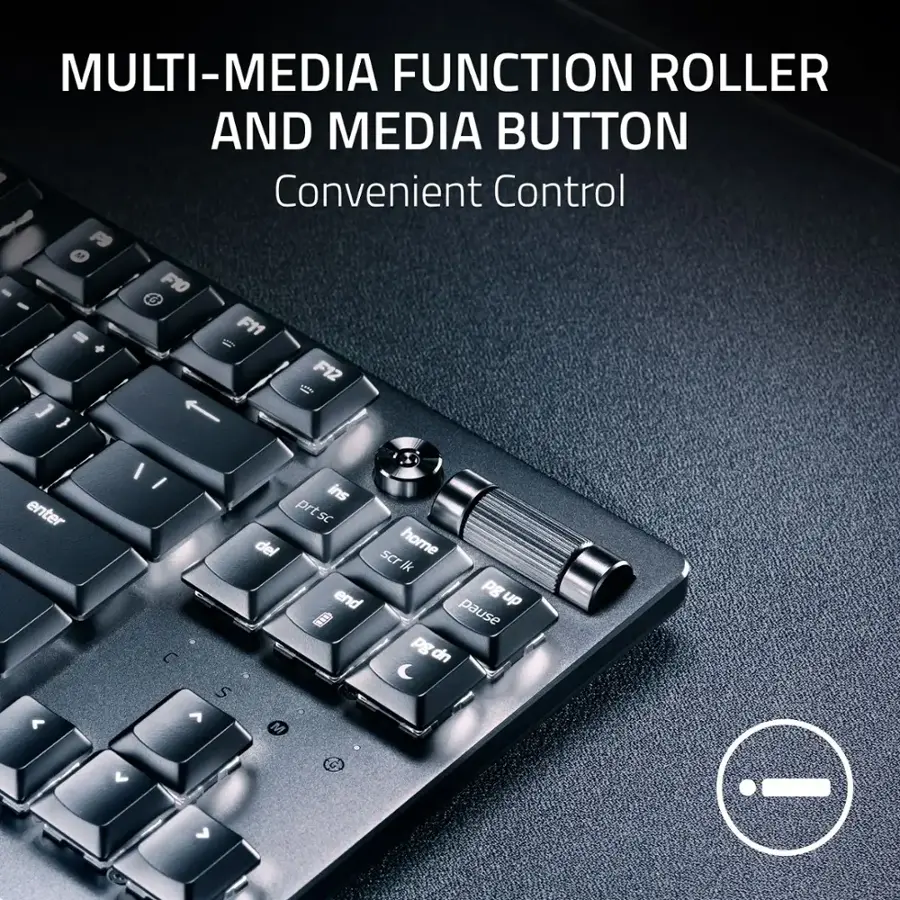 The text on the image reads: "Multi-Media Function Roller and Media Button Convenient Control - F9, AF, F10, F11, F12, [1] [I] [C] [S] [V] [ins] [prt] [scr] [home] [end] [pg up] [pg down] [pause] [pg on] [pg off]." This text describes the various functions of the multi-media function roller and media button on a keyboard.
