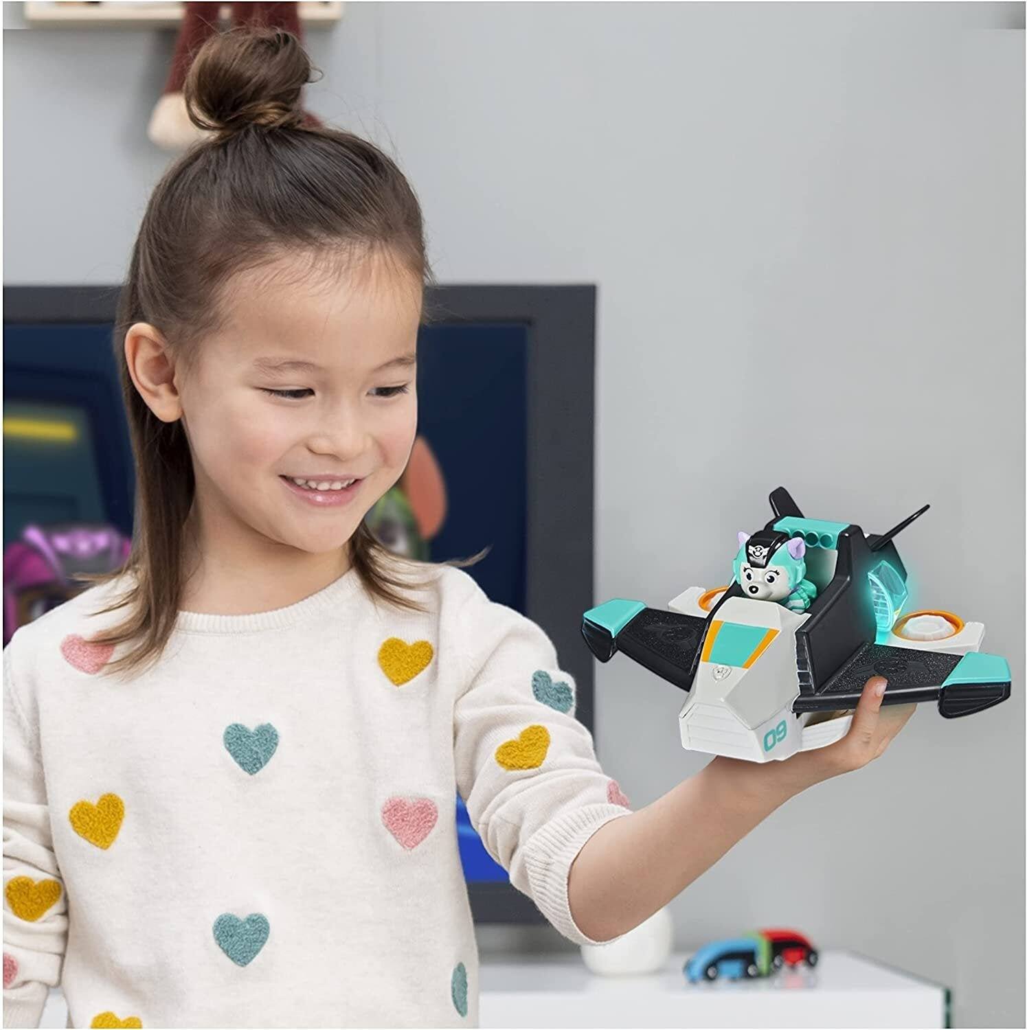 Left. Paw Patrol - PAW Patrol Everest Deluxe Jet Vehicle with Lights & Sounds, Transforming Toy, Figure Included, Ages 3+ - Multicolor.