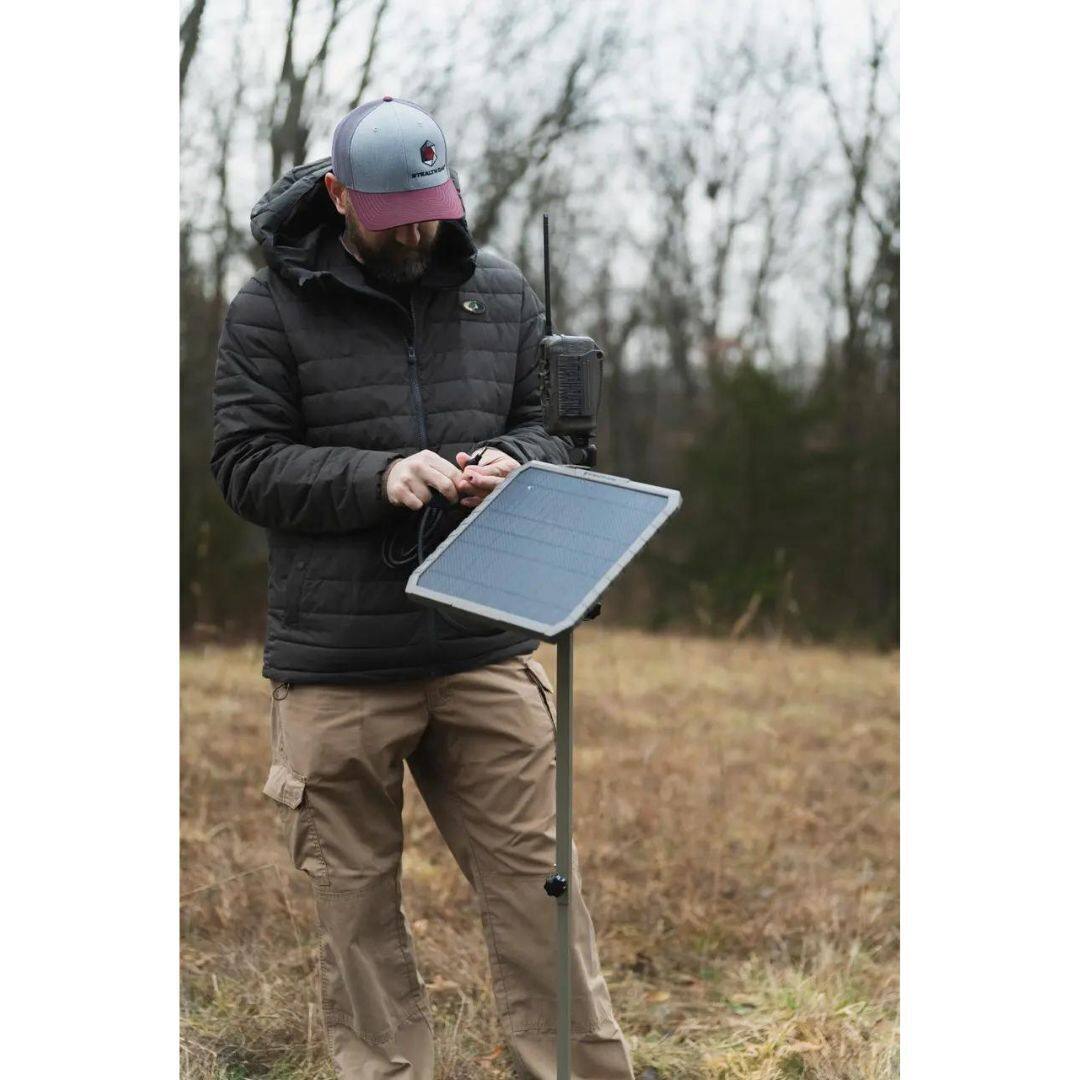 Left. Stealth Cam - Stealth Cam 40MP Deceptor Max Trail Camera 2-Pack with Solar Battery Bundle.