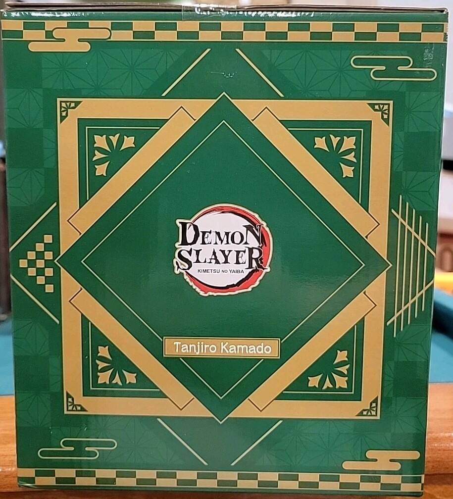 The text on the image should be grouped and corrected as follows:

**Demon Slayer: Kimetsu no Yaiba**
Tanjiro Kamado