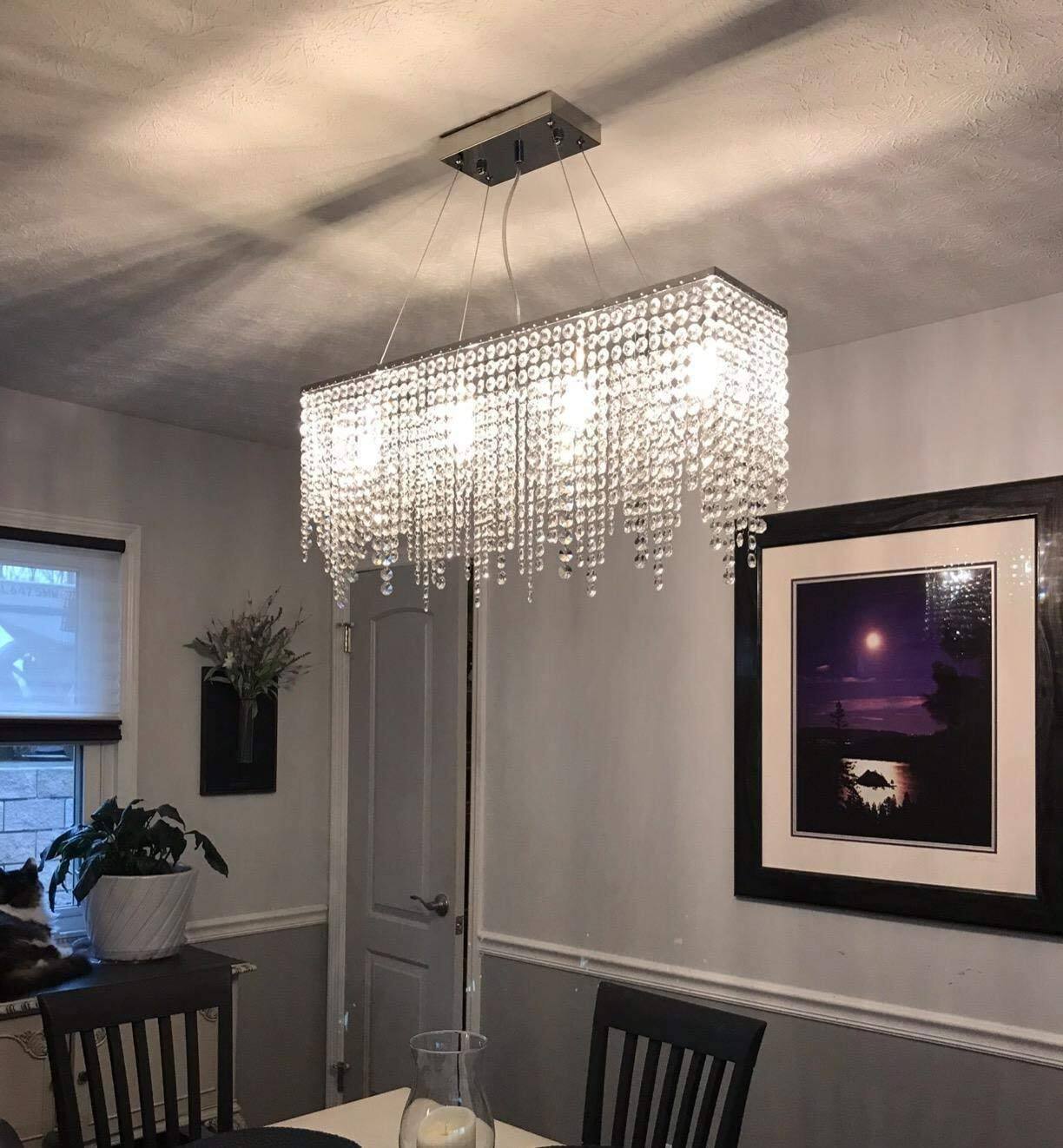 Left. Siljoy - 10 Light Rectangle Crystal Chandelier Ideal for Dining Room & Kitchen Island Pendant Lighting - Silver.