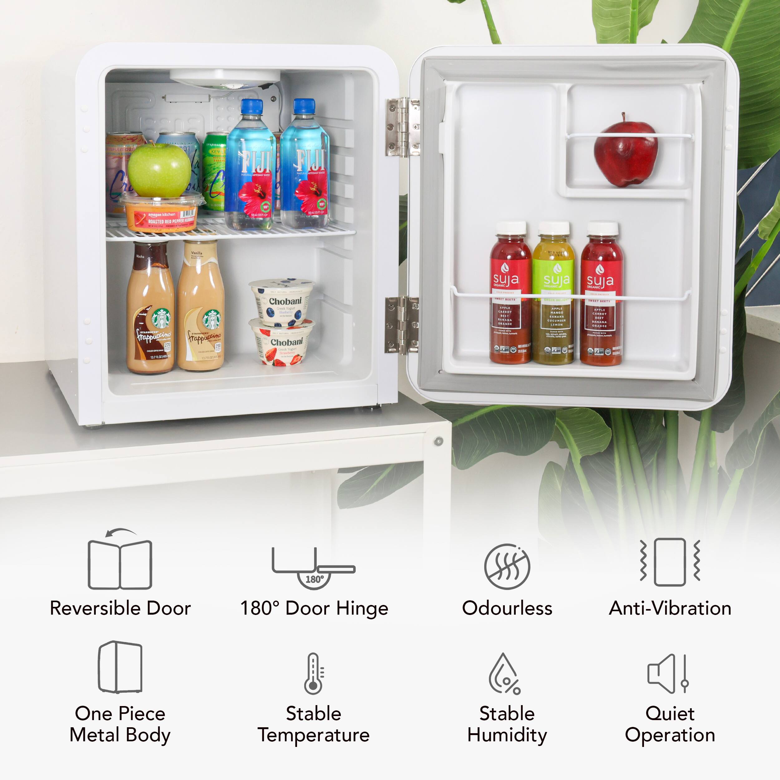 The text on the image is grouped and corrected as follows:

1. Reversible Door: This refrigerator has a reversible door, allowing for easy access from both sides.
2. 180 Door Hinge: The refrigerator features a 180-degree door hinge, which provides a wider opening for easy access to the contents.
3. Odourless: The refrigerator is designed to prevent odors from developing, ensuring that the food remains fresh and free from unpleasant smells.
4. Anti-Vibration: The refrigerator is equipped with anti-vibration technology, which helps to minimize noise and vibrations produced by the appliance.
5. One Piece Metal Body: The refrigerator has a one-piece metal body, which provides a sturdy and durable construction.
6. Stable Temperature: The refrigerator maintains a stable temperature, ensuring that the food remains at the optimal temperature for preservation.
7. Stable Humidity: The refrigerator also maintains a stable humidity level, which is essential for preserving the freshness and quality of certain food items.
8. Quiet Operation: The refrigerator operates quietly, making it a convenient appliance for use in a bedroom or other quiet areas of the home.