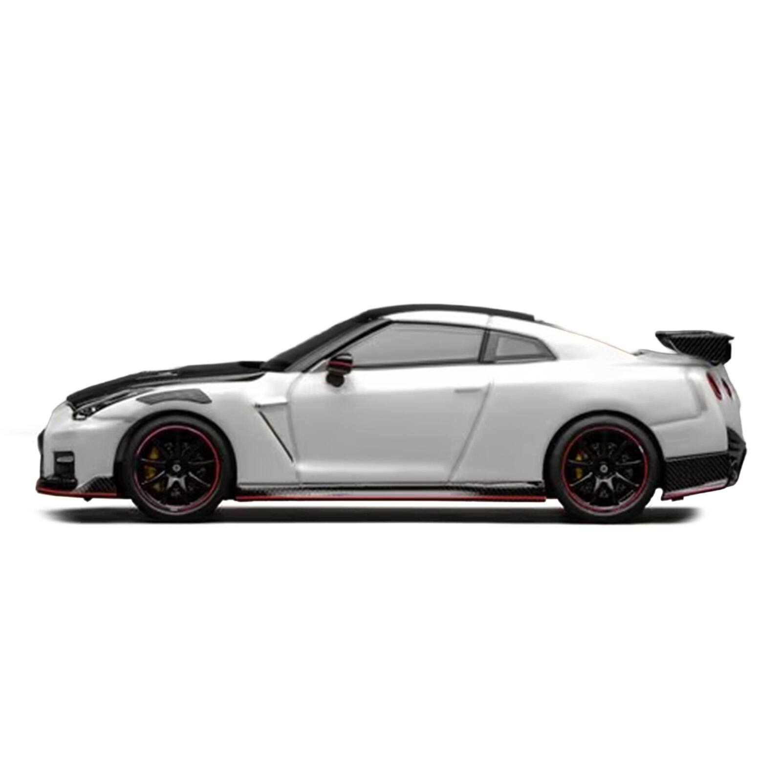 Alt View 2. MotorHelix - 2022 Nissan GT-R Nismo R35 RHD Brilliant White Pearl with Carbon Hood and Top "Senior 64" 1/64 Car by MotorHelix.