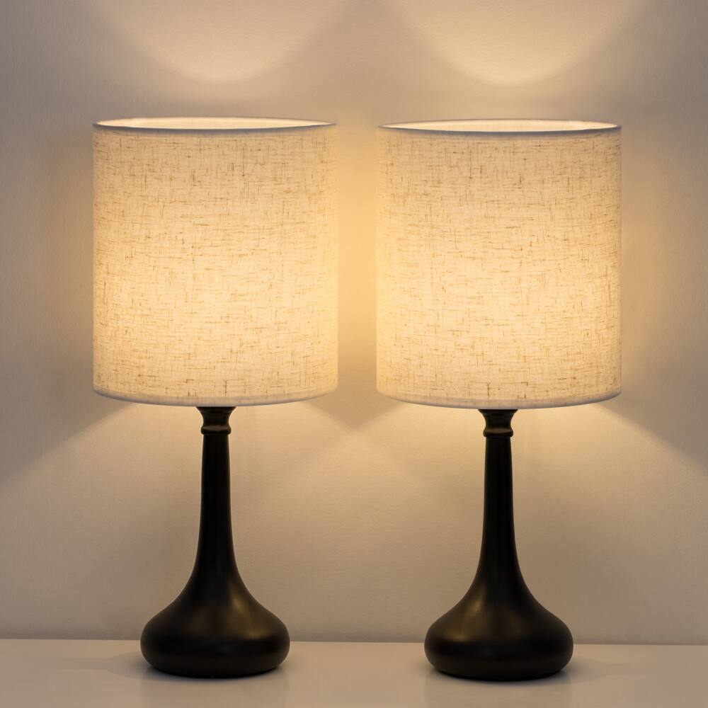 Back. Oumilen - Curved Black Metal Table Lamp with Natural Linen Cylinder Shade.