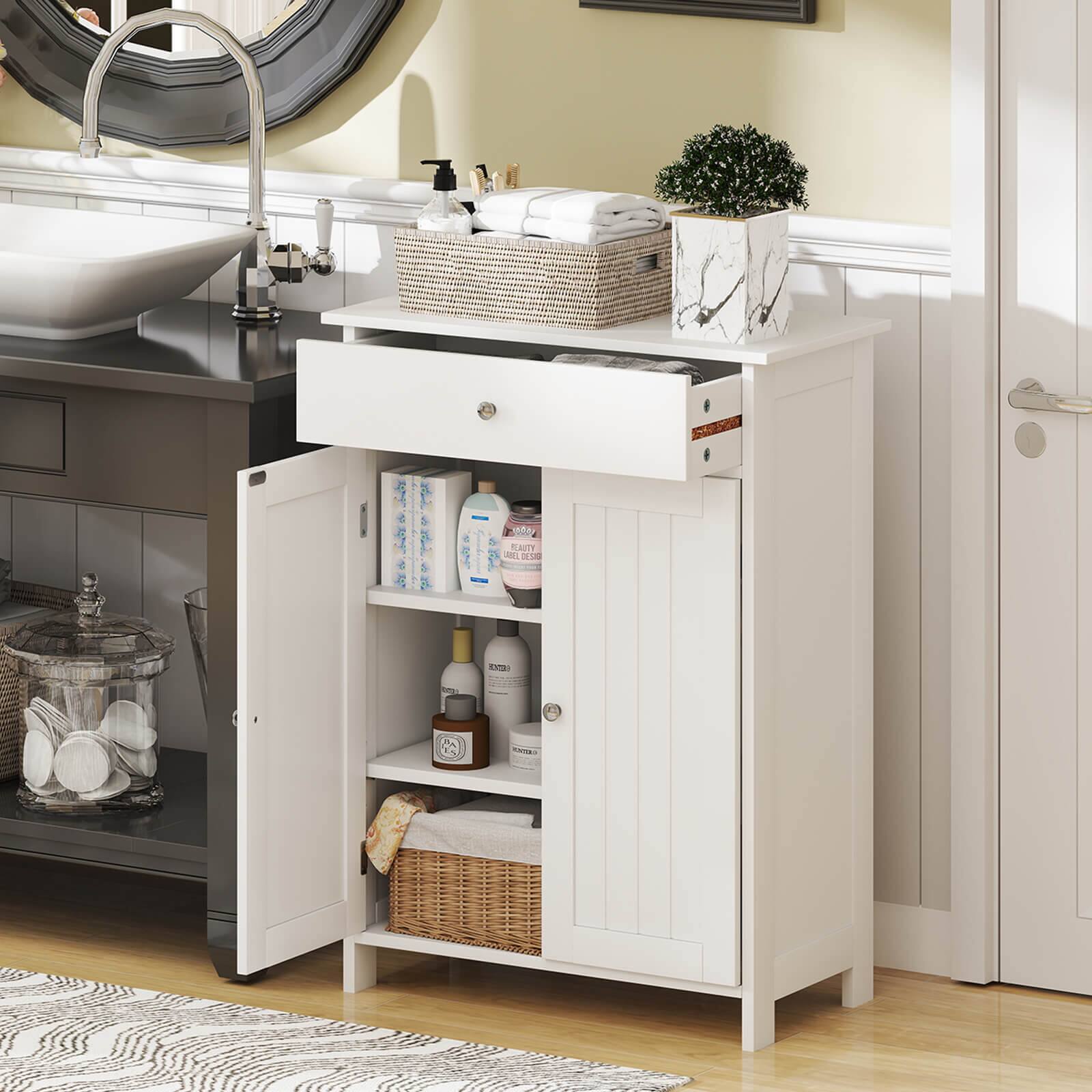 The image shows a bathroom with a sink, a mirror, and a vanity. The vanity is white and has a drawer and a shelf. On the shelf, there are several bottles, including some with labels that say "beauty." The drawer is filled with various items, including a basket. The bathroom also features a potted plant, adding a touch of greenery to the space.