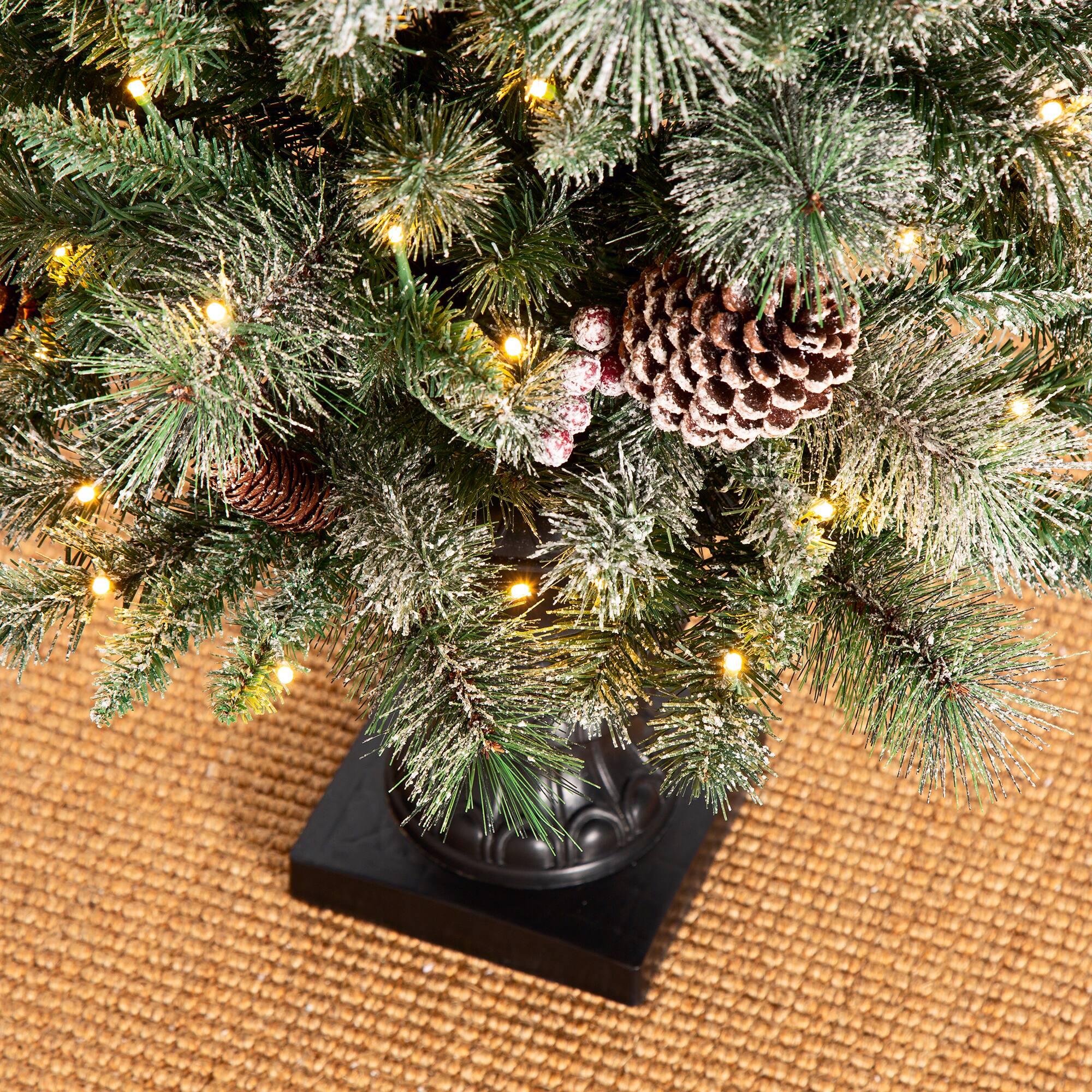 Alt View 9. Glitzhome - Set of Two 5ft Pre-Lit Flocked Pine Artificial Christmas Porch Tree with 130 Warm White Lights - White.