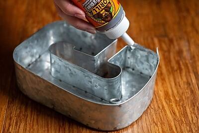 The text on the image reads:

"ORILLATLACK
Original
Wood Stain
and Finish"