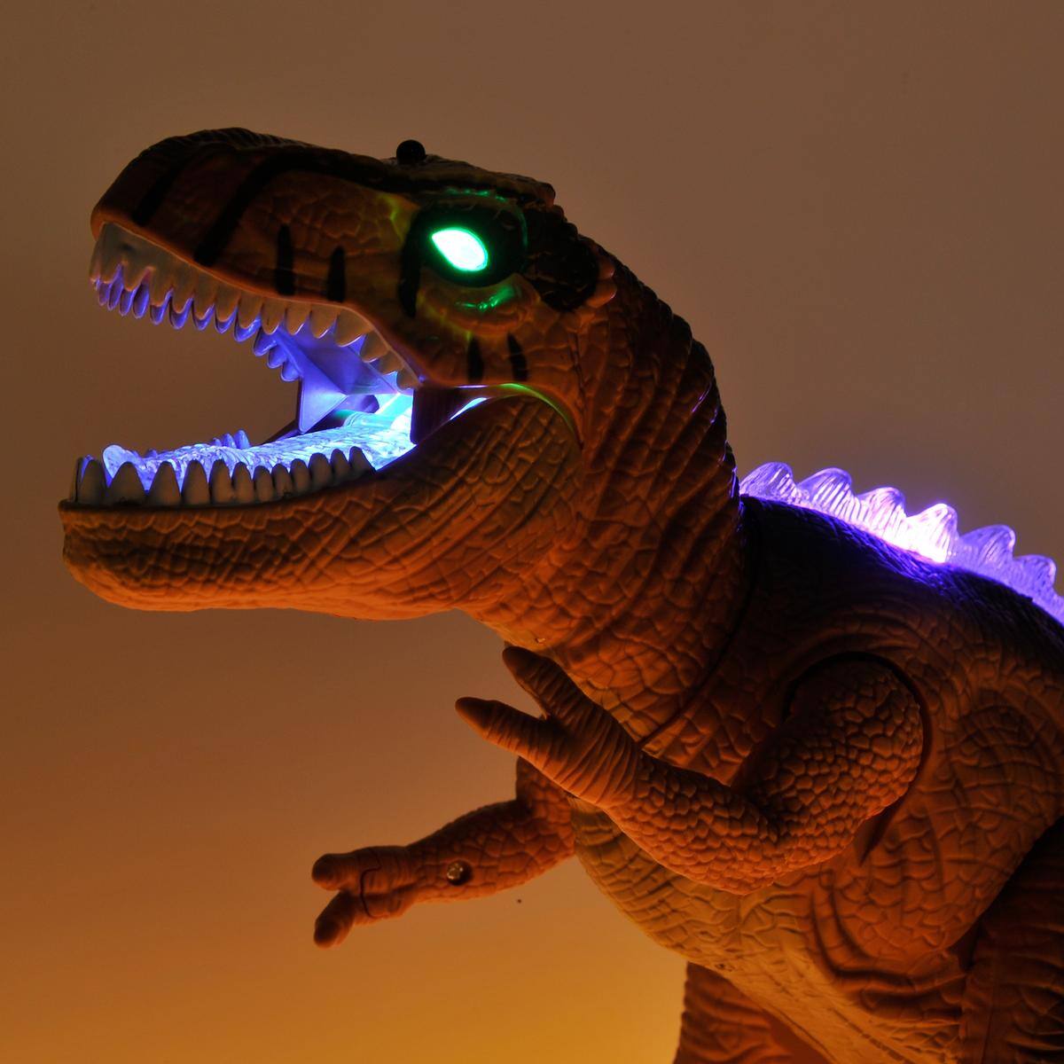 Alt View 1. JuzToys - Remote Control Dinosaur Toy, Walking T-Rex with Light & Sound Effects, RC Dino Toy for Kids – Brown - Brown.