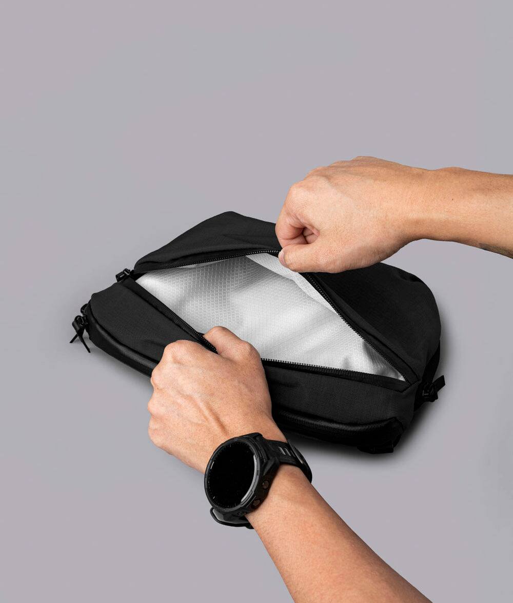 Alt View 1. ALPAKA - Flight Sling Pro 2.5L Sling Bag Crossbody Bag for Men, Bottle/Umbrella Sleeve, Fits 8.3" Tablet, YKK AquaGuard - Black Axoflux 400D Ripstop Nylon.