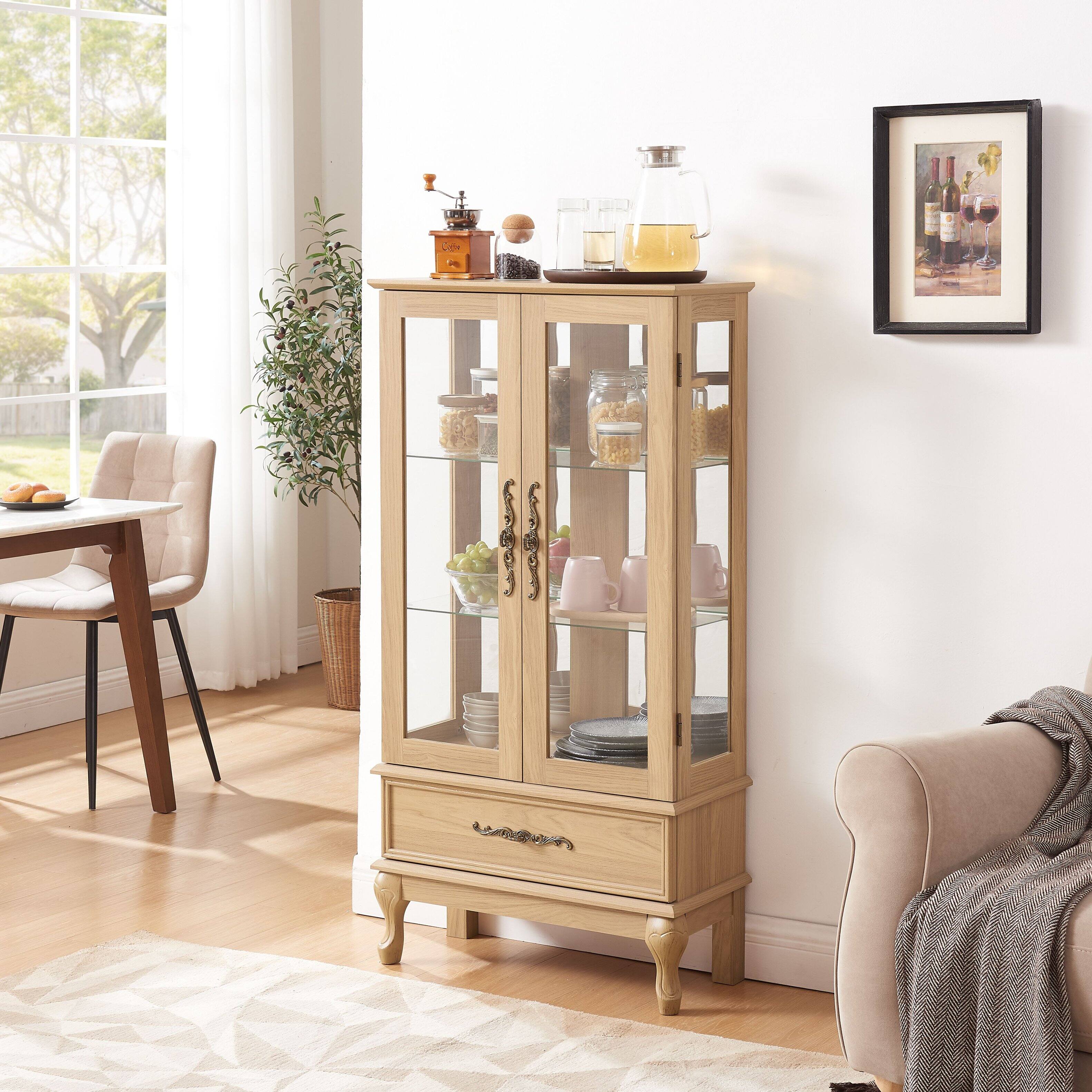 Left. Mirfee - Lighted Curio Cabinet with Adjustable Glass Shelves, 2 Doors, 1 Drawer, Dark Cherry - Light Oak.