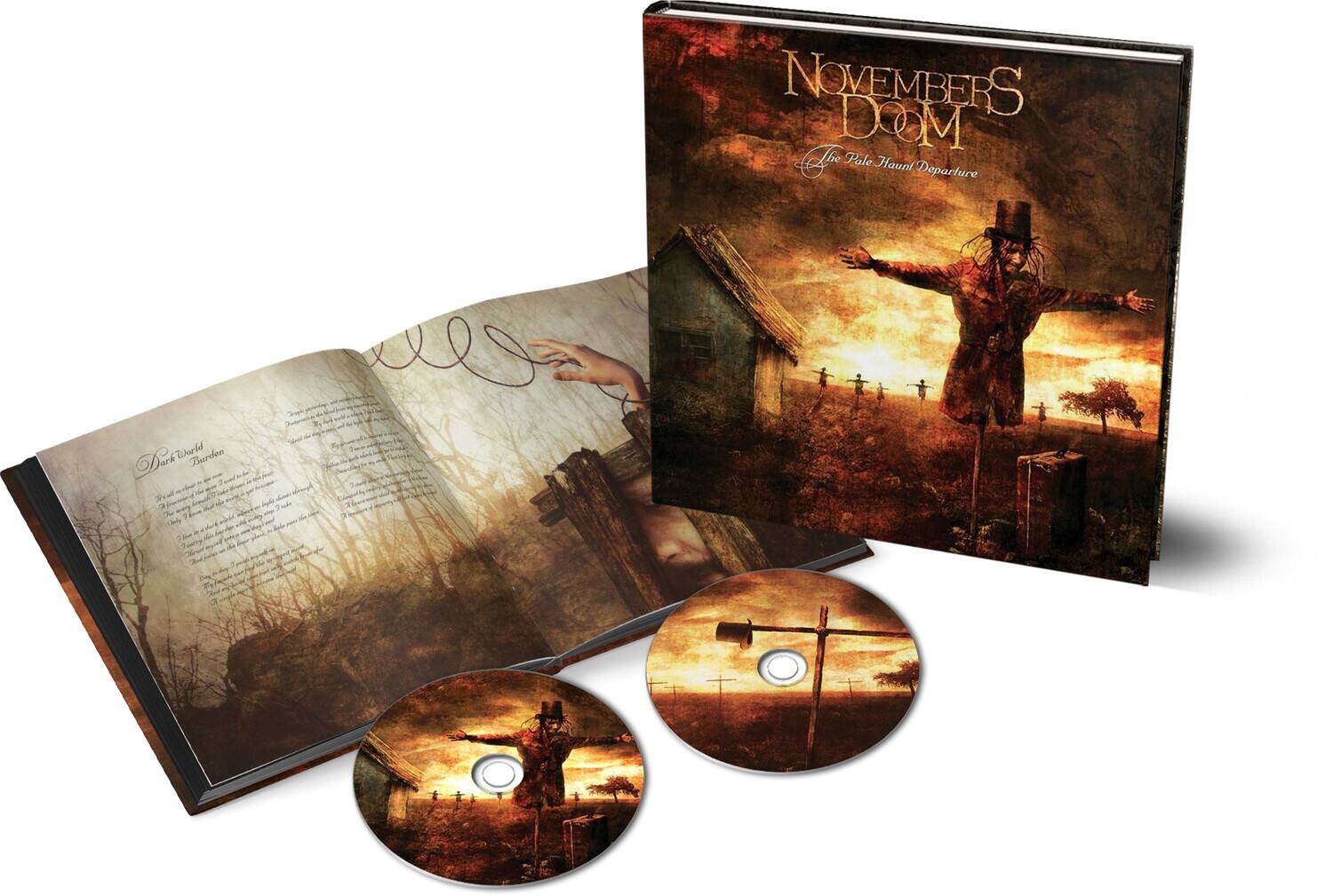 NOVEMBER'S DOM  
The Pale Haunt Departure  

Dark Wood Burden  

[Text on the left page is not fully legible, but it appears to be a handwritten letter or narrative.]