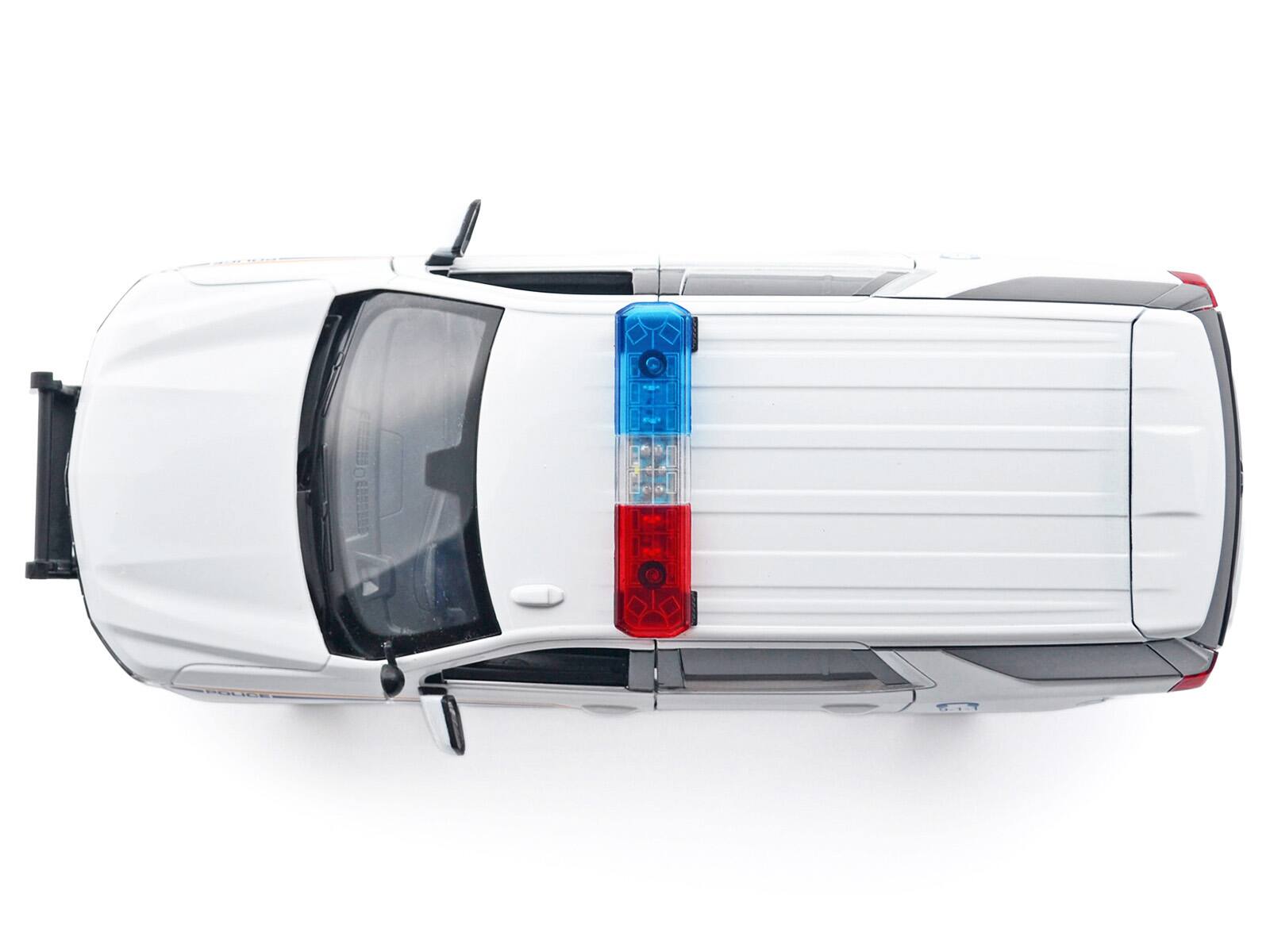 Alt View 4. Motormax - 2025 Chevrolet Tahoe PPV "RCMP" White with Stripes with Light Bar and Lights and Sounds 1/24 Model Car by Motormax.