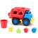 The image features a toy truck and a toy bucket. The toy truck is red and blue, and it has a yellow front. The toy bucket is red and is placed next to the toy truck. There are also several small toy pieces, including a star and a triangle, which are scattered around the toy truck and the bucket.