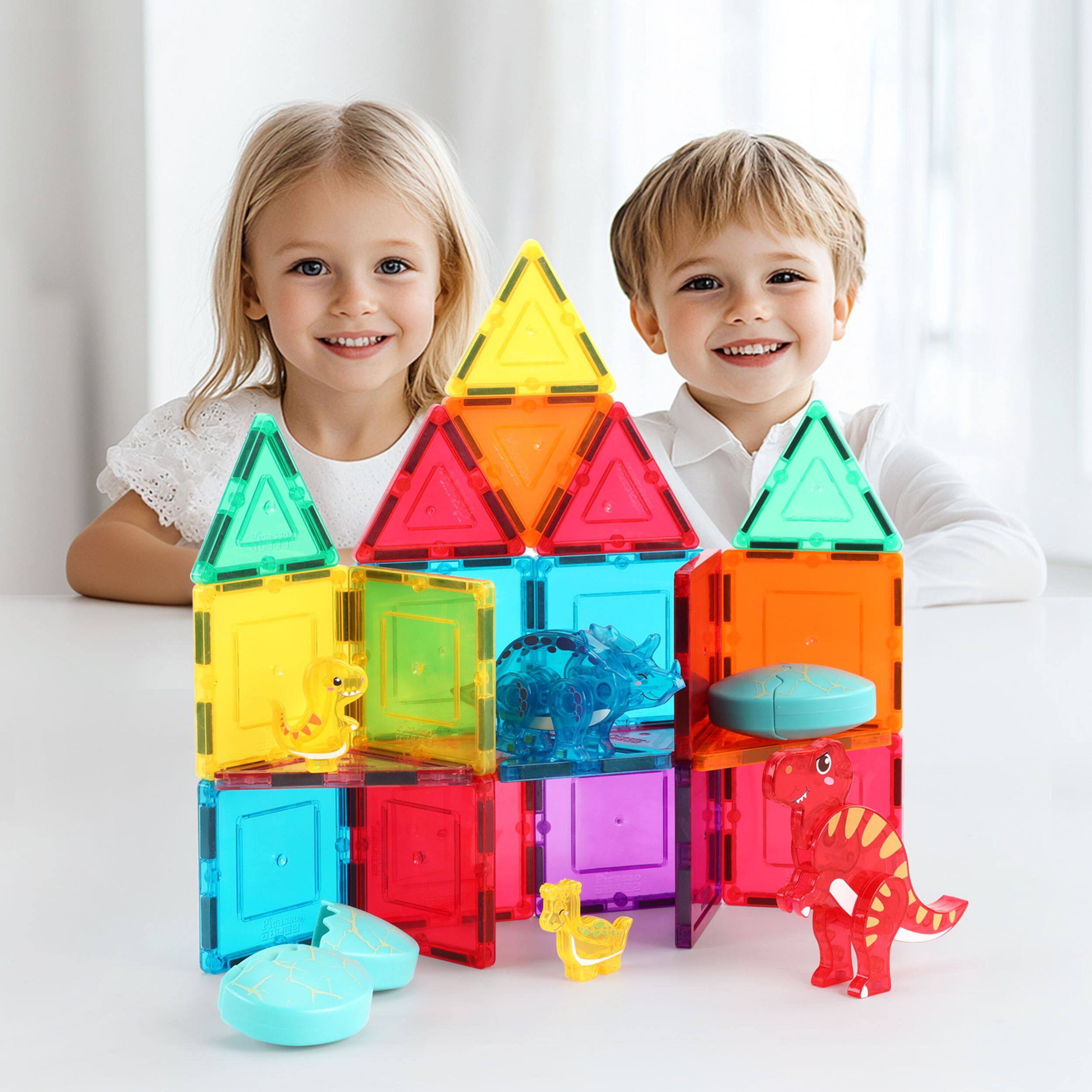 Alt View 1. PicassoTiles - Magnetic Dinosaur Egg Set – 4 Dino Figures with 2 Hatchable Eggs, STEM Building & Pretend Play Toy for Kids 3+.
