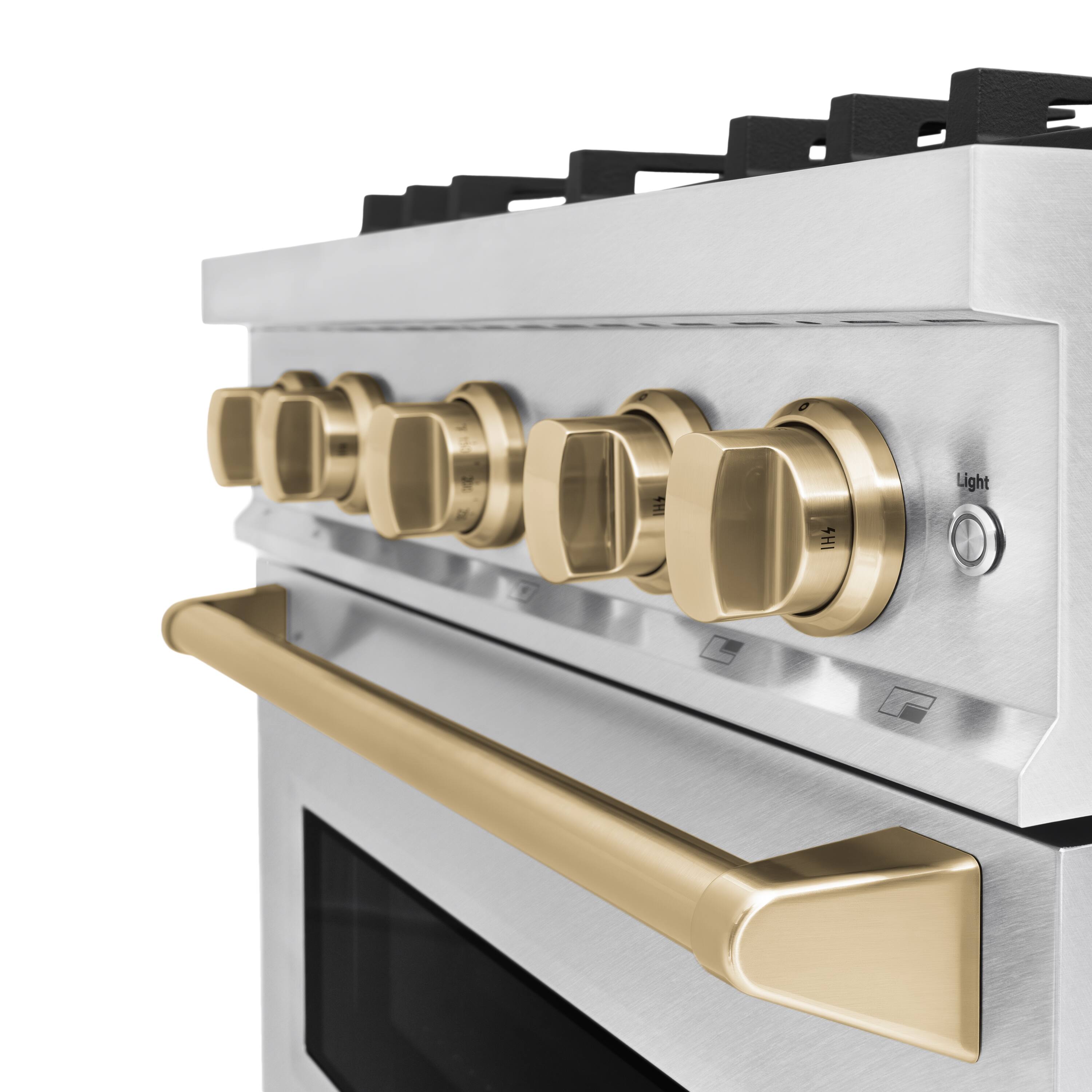 The image shows a stainless steel oven with a gold knob and a black handle. The oven has a black knob and a gold knob, and it is set to 0 degrees. The oven is made of stainless steel, and it has a black handle.