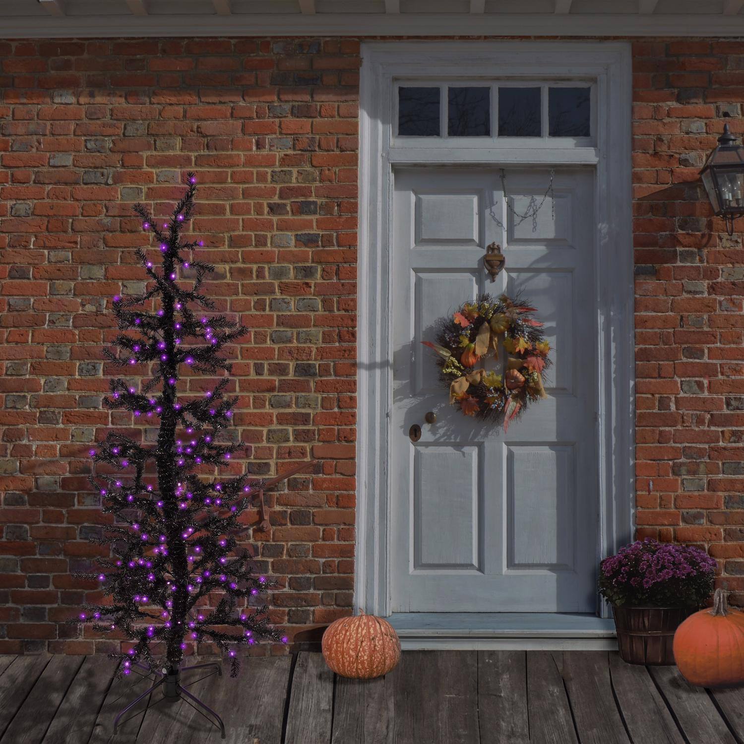 Angle. Celebrations - Celebrations Orange/Purple 140 ct 5 ft. LED Prelit Animated Halloween Tree - Black | Orange | Purple.