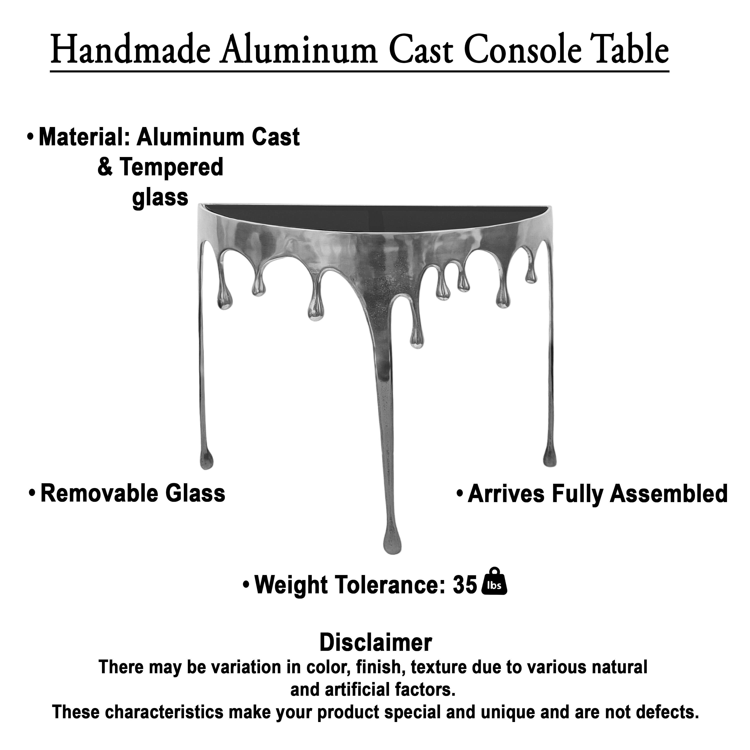 Handmade Aluminum Cast Console Table

- Material: Aluminum Cast & Tempered glass
- Removable Glass
- Arrives Fully Assembled
- Weight Tolerance: 35 lbs

Disclaimer
There may be variation in color, finish, texture due to various natural and artificial factors. These characteristics make your product special and unique and are not defects.
