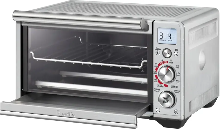The text on the image reads: "SUPER CONVECTION + F 384 C MS TURN SHAKE DARKNESS PIECES SPNLESS HICKNESS 1 2 Super Convection D/X 2 AIR FRY TOAST FRIES A Bit More BAGEL WINGS PIZZA 3 BACON CRISPY REHEAT Thickness Crispness BROIL BAKE & ROAST Darkness Pieces TEMP TIME Breville T".