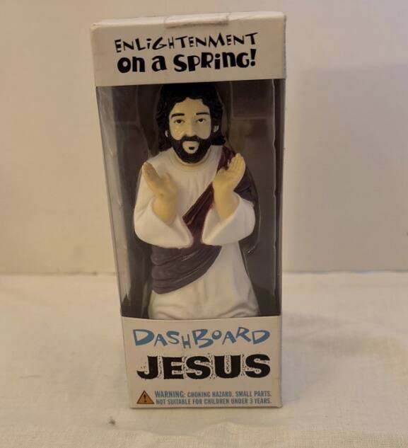ENLIGHTENMENT on a SPRING!  
DASHBOARD JESUS  
WARNING: CHOKING HAZARD. SMALL PARTS. NOT SUITABLE FOR CHILDREN UNDER 3 YEARS.