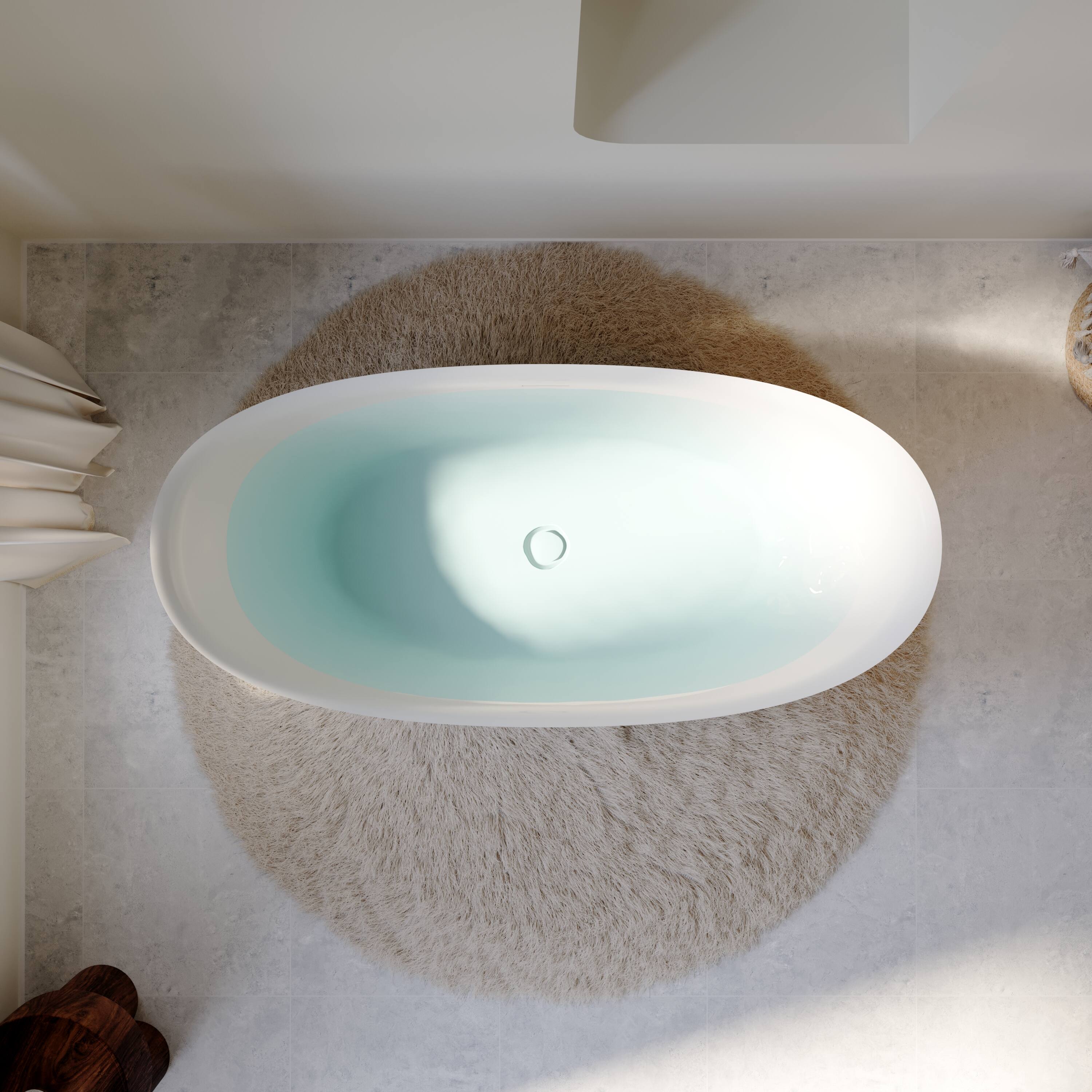 Angle. WELLFOR - Villa 60 in. x 28.75 in. Acrylic Oval Freestanding Soaking Bathtub with Center Drain and Overflow - White.