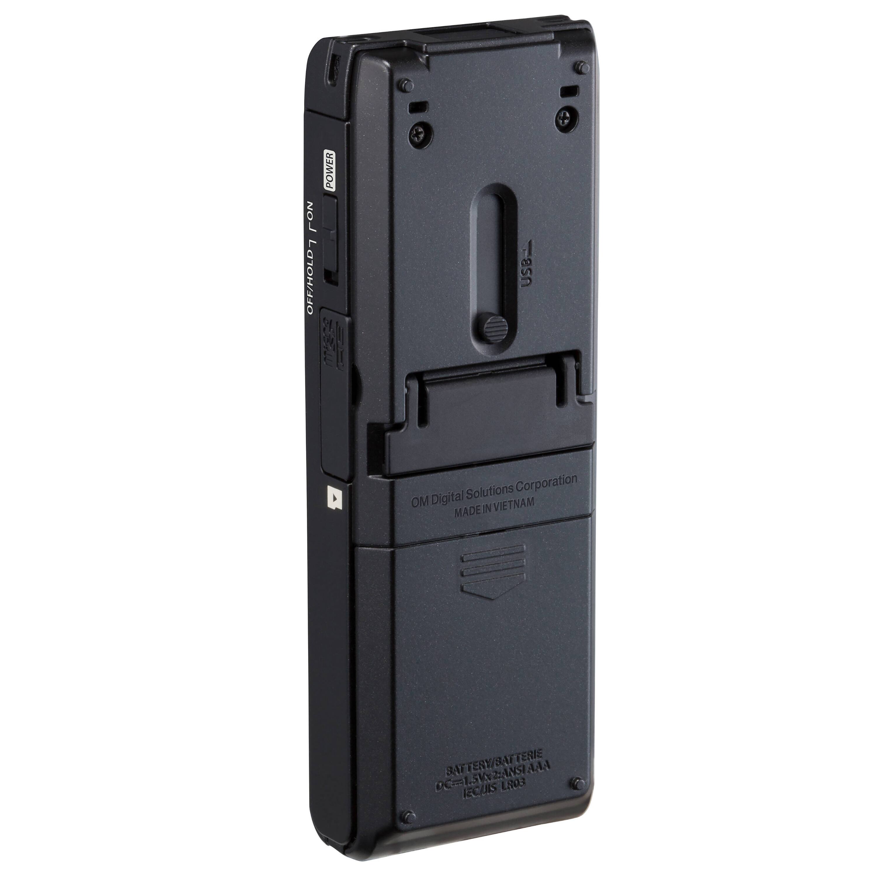 The text on the image reads: "POWER FON OFF/HOLD7 2 USB Solutions Corporation OM Digital VIETNAM MADE N DE=1SVNZANSIAAA JECINS 803."