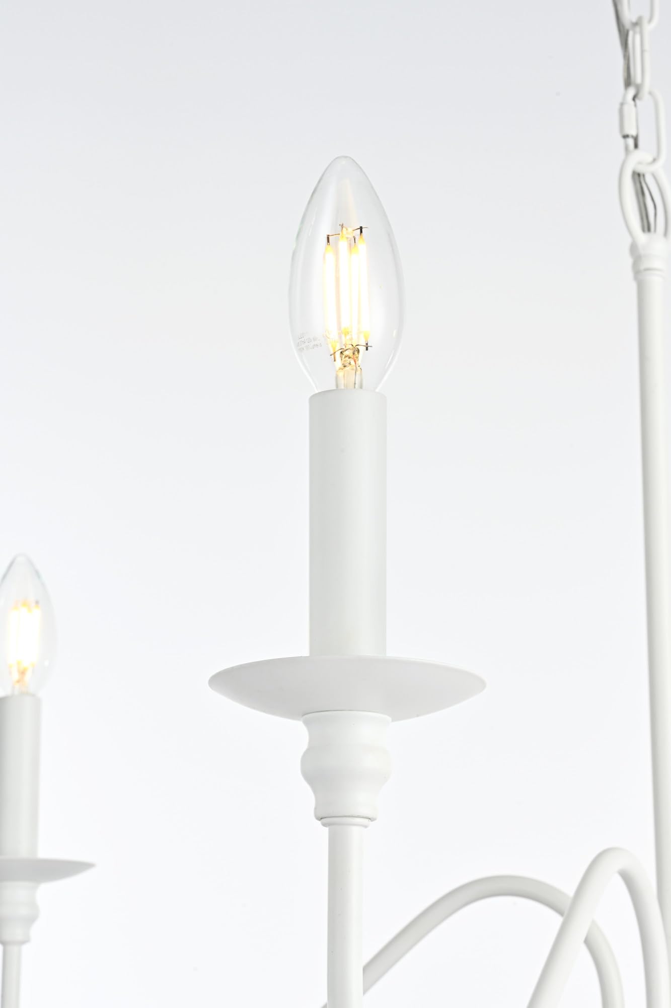 Left. Living District - Rohan 30 inch chandelier in White - White.