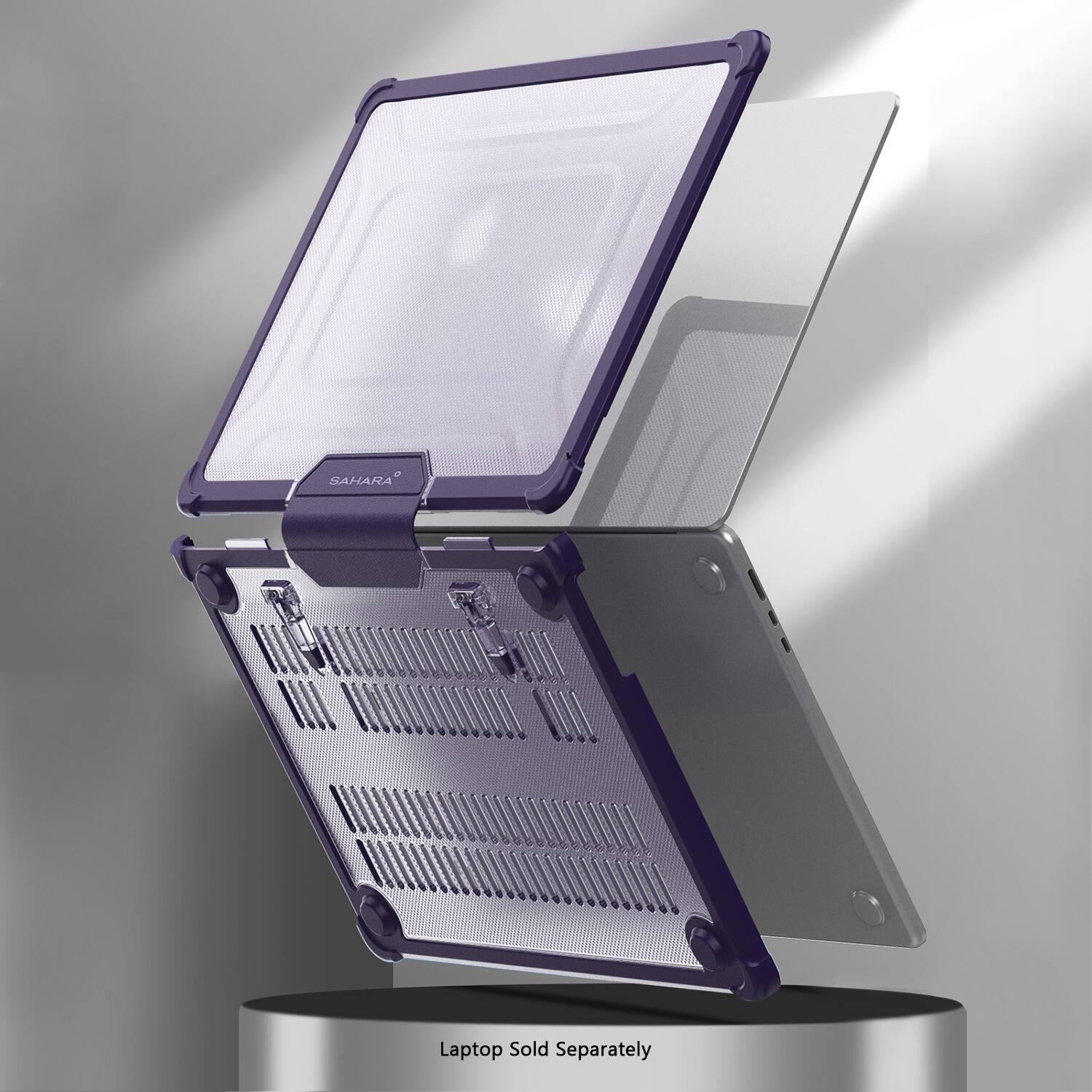 The image features a laptop computer that is sold separately. The laptop is open, revealing its components, and it is displayed in a purple and silver color scheme. The laptop is positioned on a stand, which allows it to be showcased prominently. The text "SAHARA Laptop Sold Separately" is displayed on the image, indicating that the laptop is not included with other items and must be purchased separately.