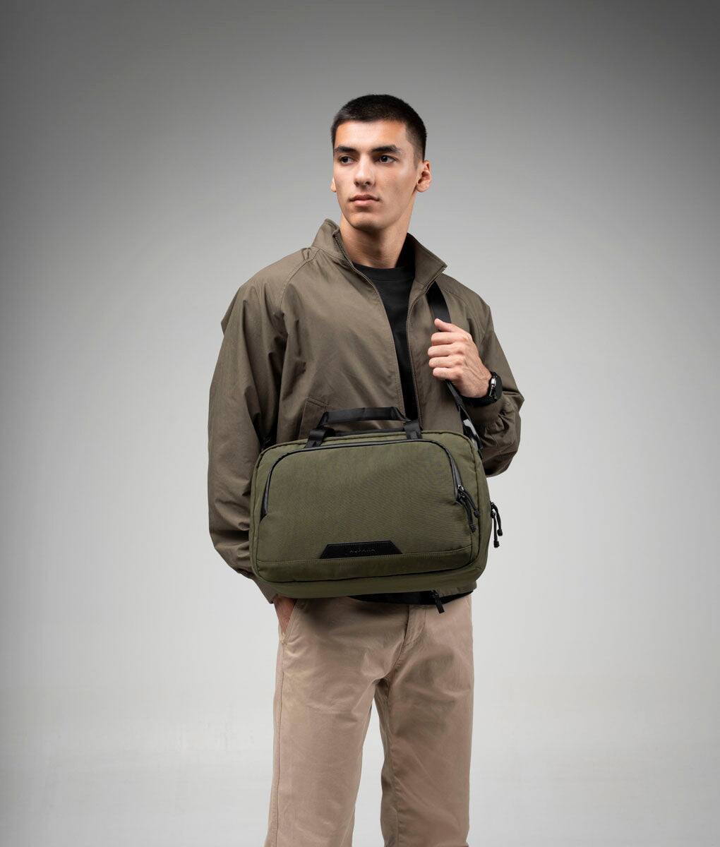 Left. ALPAKA - Bravo Brief for 14" Laptop with Detachable Shoulder Strap and Luggage Pass-Through - Green.