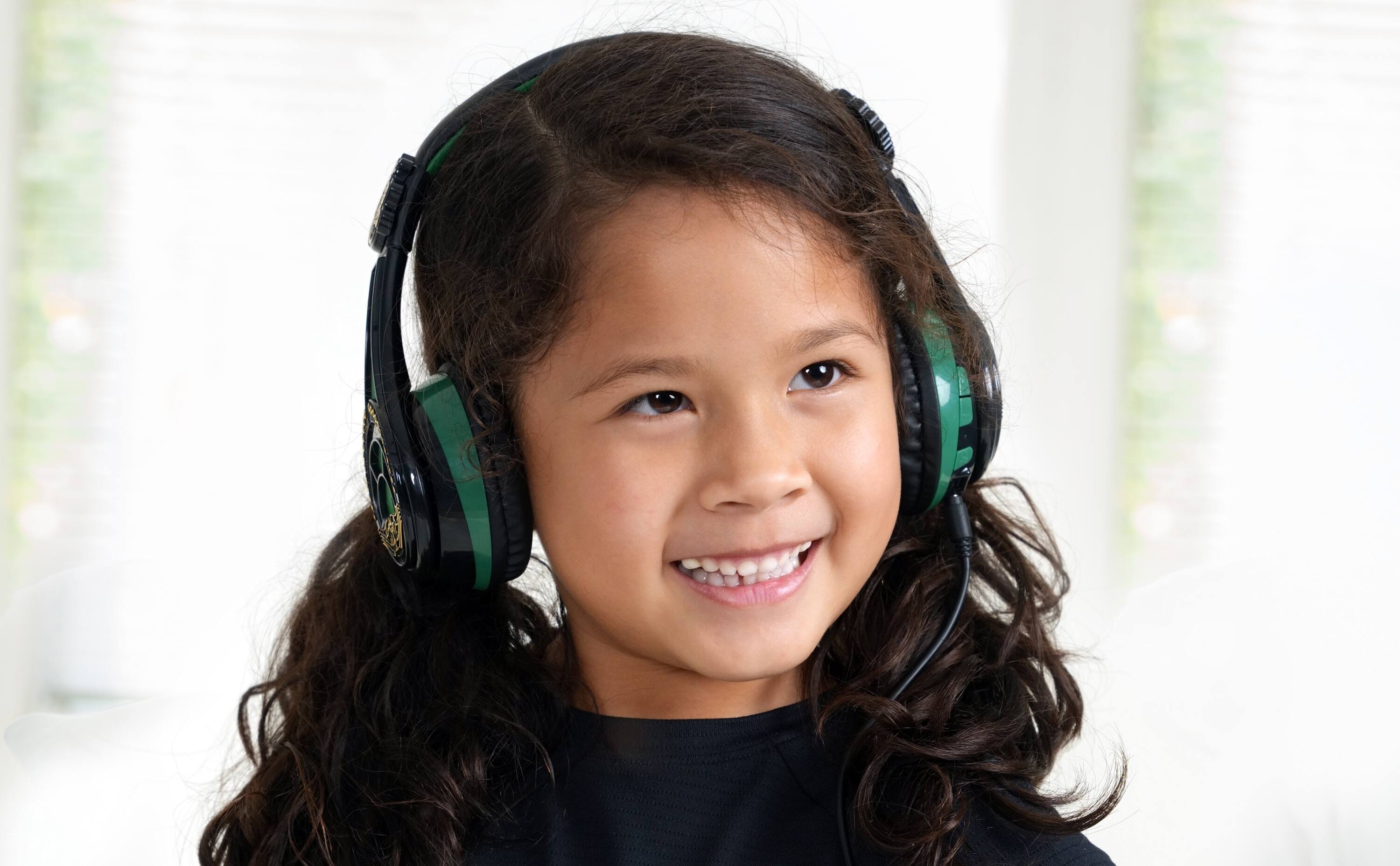 Left. eKids - eKids Wicked Elphaba Bluetooth Headphones for Kids, Wireless Headphones for School, Home, or Travel - Multicolor.