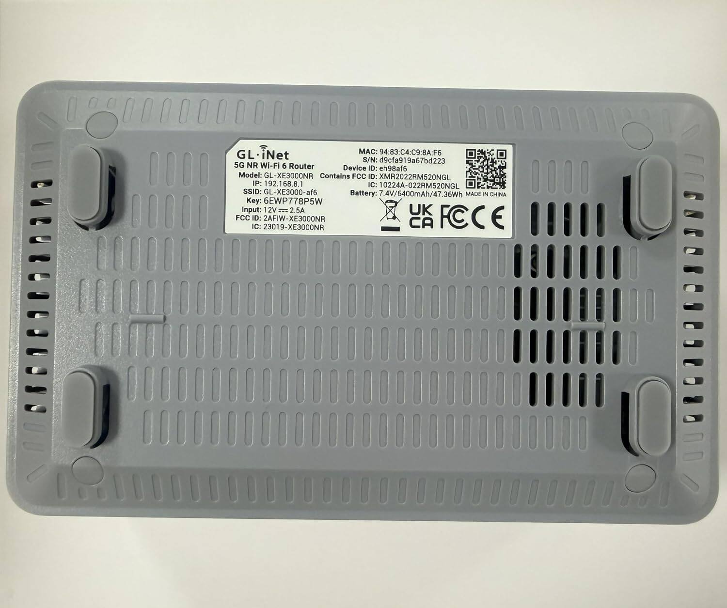 GL-iN iNet  
MAC: 94:83:C4:C9:8A:F6  
S/N: d9cfa919a67bd223  
5G NR WI-FI 6 Router  
Device ID: eh98af6  
Model: GL-XE3000NR  
Contains FCC ID: XMR2022RM520NGL  
IP: 192.168.8.1  
IC: 10224A-022RM520NGL  
SSID: GL-XE3000-af6  
Battery: 7.4V/6400mAh/47.36Wh  
MADE IN CHINA  
Key: 6EWP778P5W  
Input: 12V - 2.5A  
UK FCC IC: ID: 23019-XE3000NR 2AFIW-XE3000NR  
CA FCCE