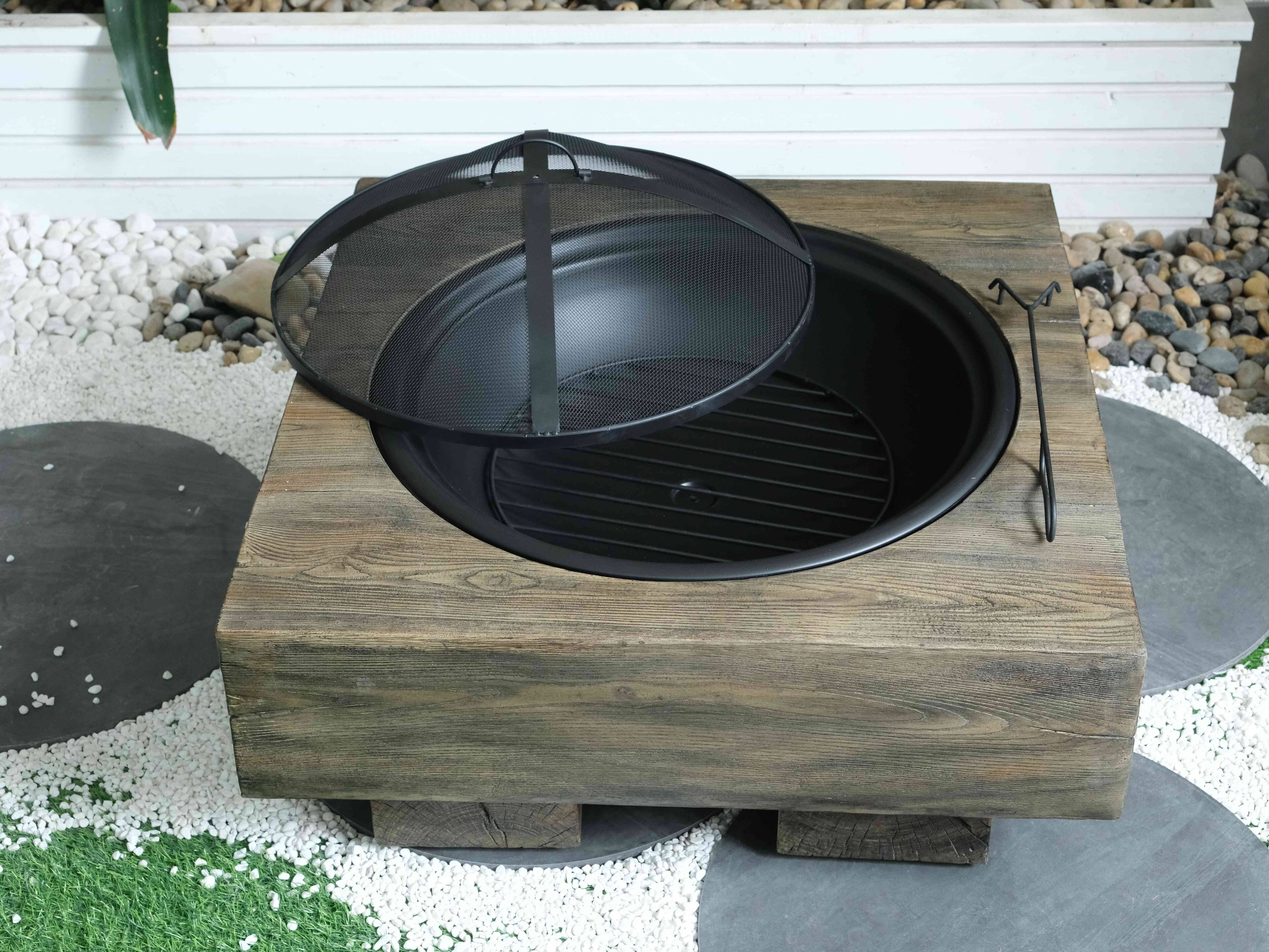Left. APRILSOUL - Wood Fueled Outdoor Fire Pit with Wood Grain Design - Antique.